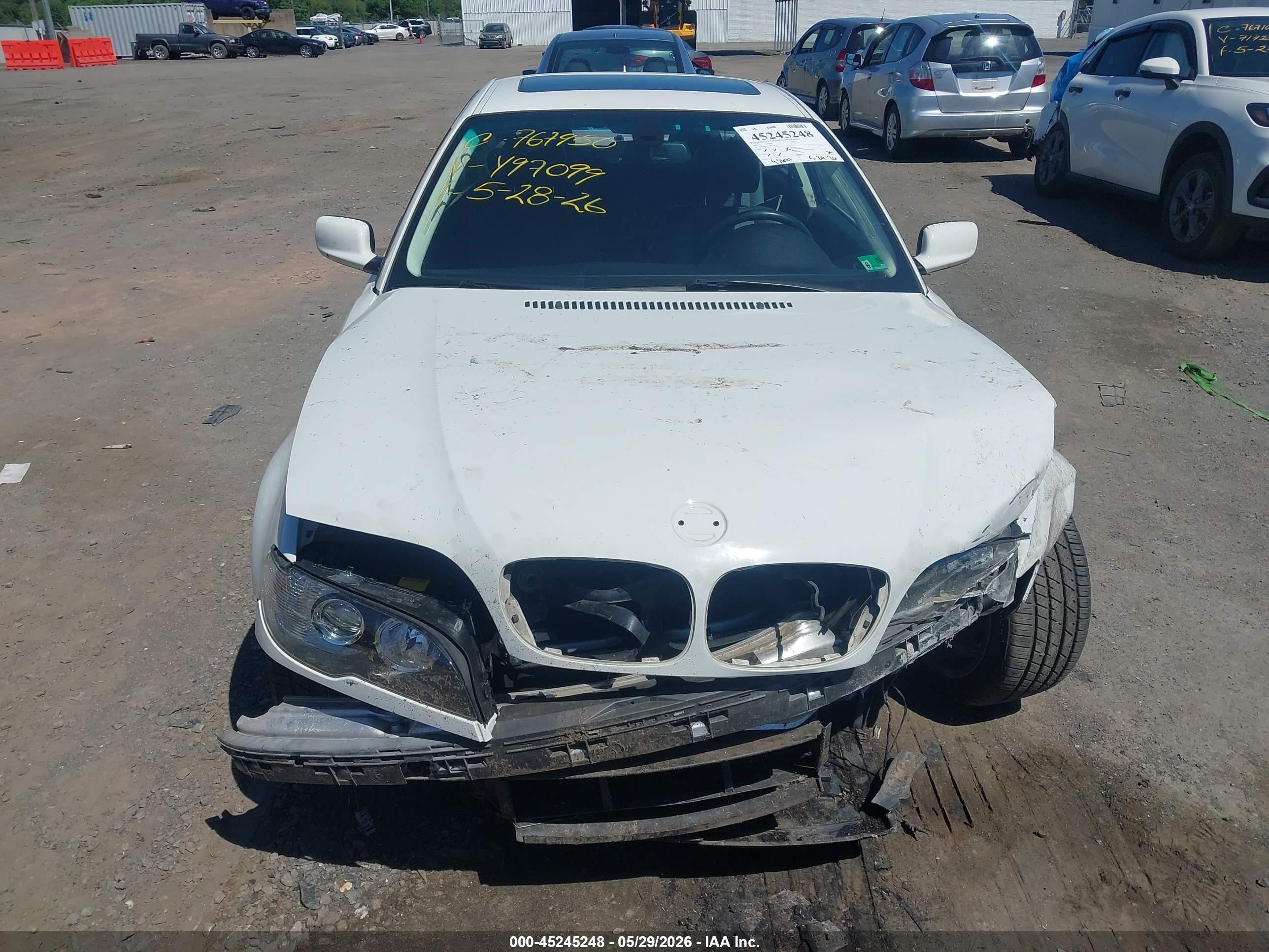 2004 Bmw 325ci   White vin: WBABD33494JY97099