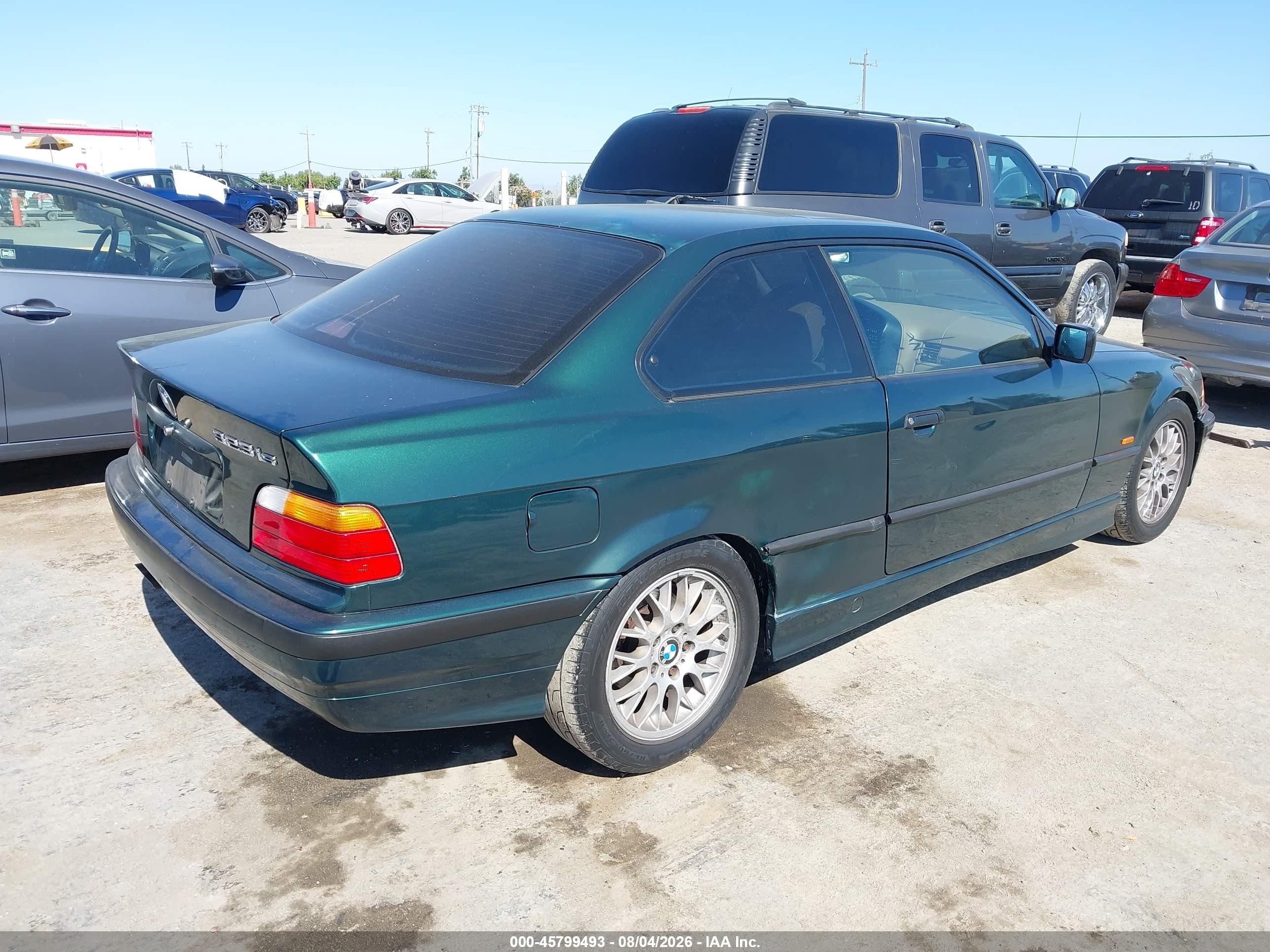1998 Bmw 323is   Green vin: WBABF7323WEH41770
