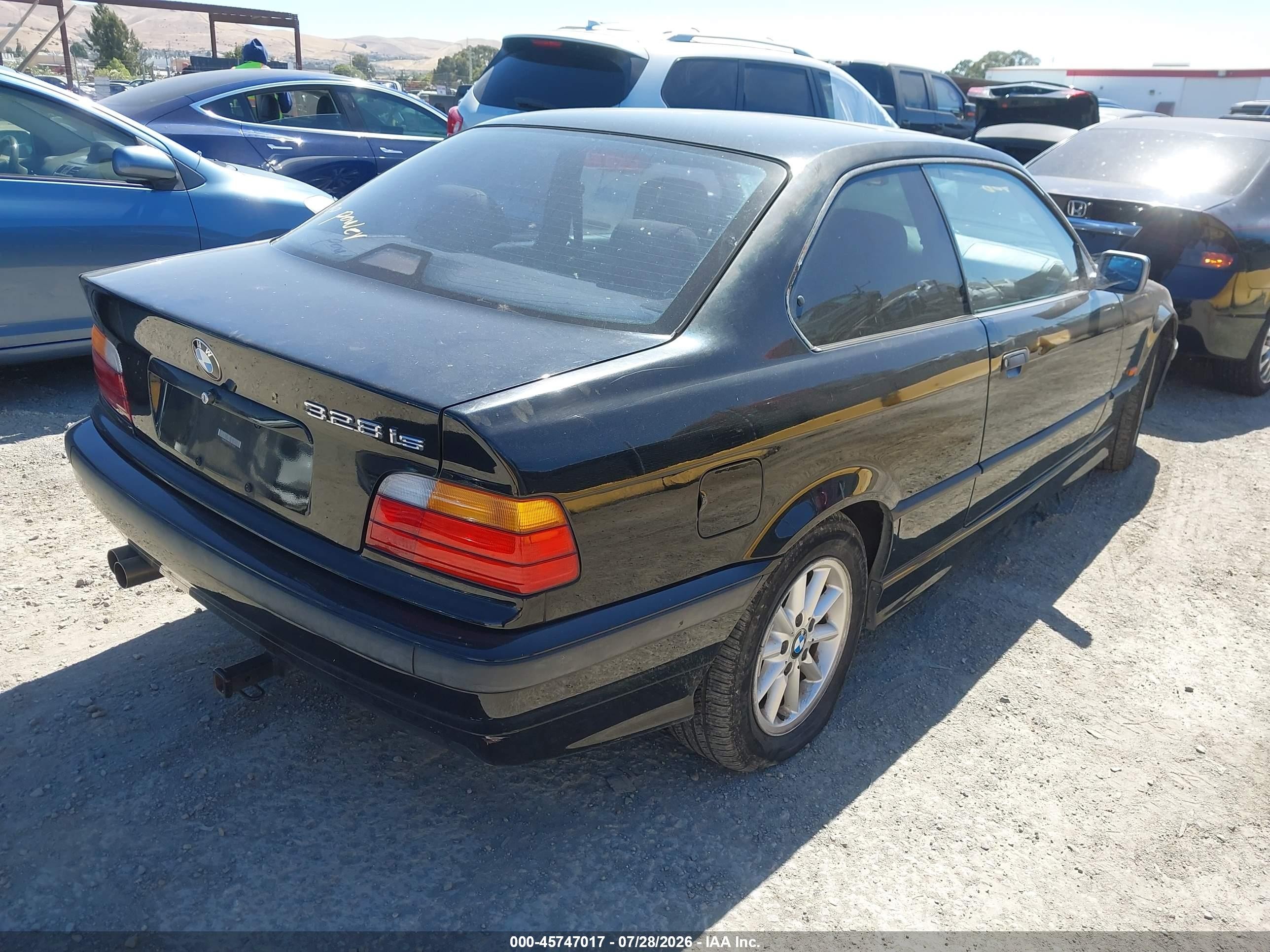 1999 Bmw 328is   Black vin: WBABG233XXET38568