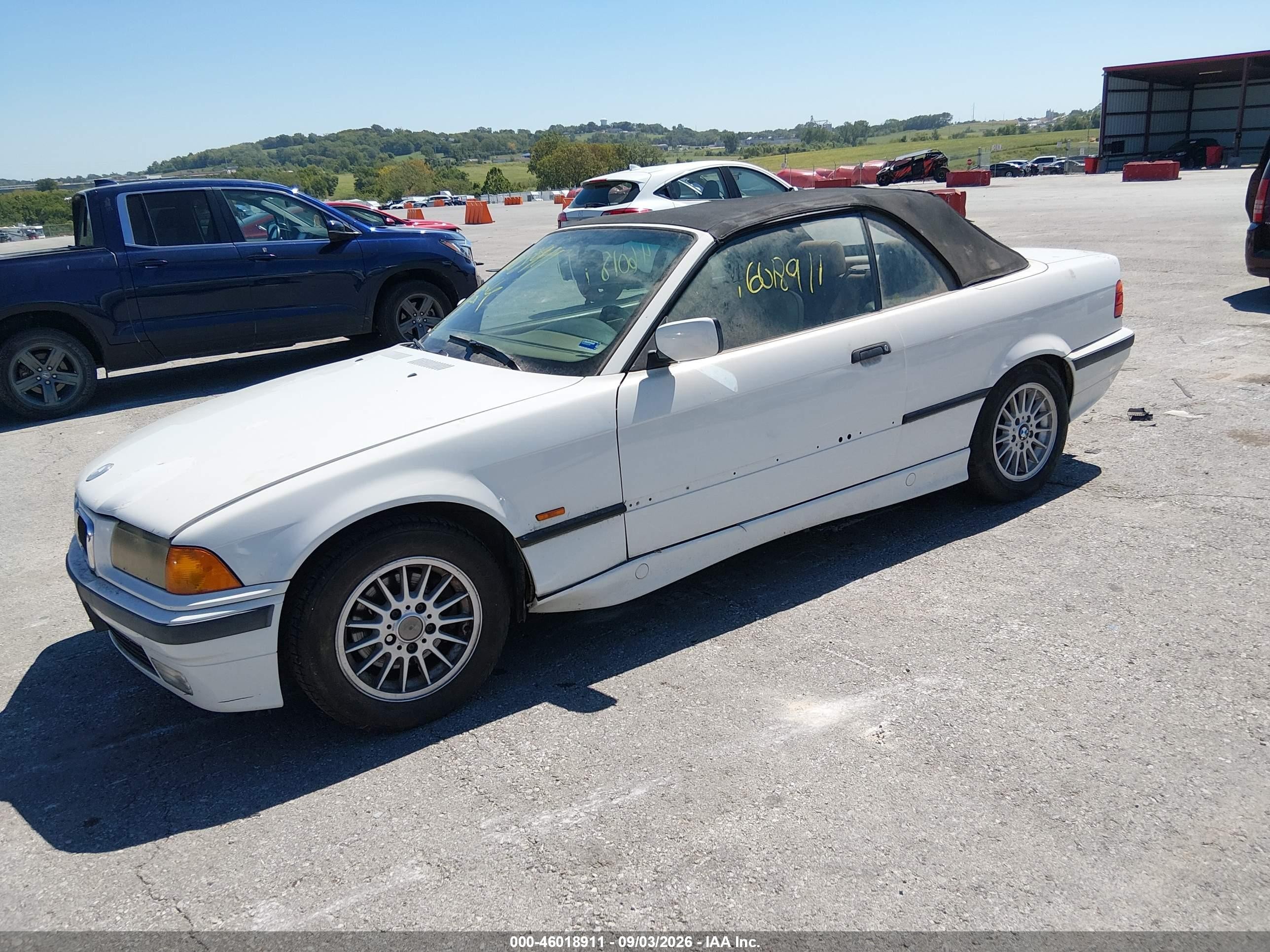 1998 Bmw 323ic   White vin: WBABJ8325WEM20167