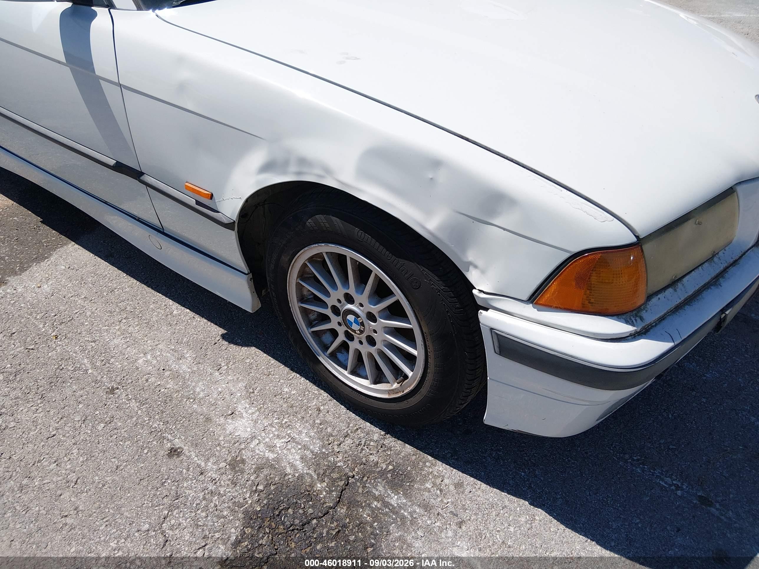 1998 Bmw 323ic   White vin: WBABJ8325WEM20167