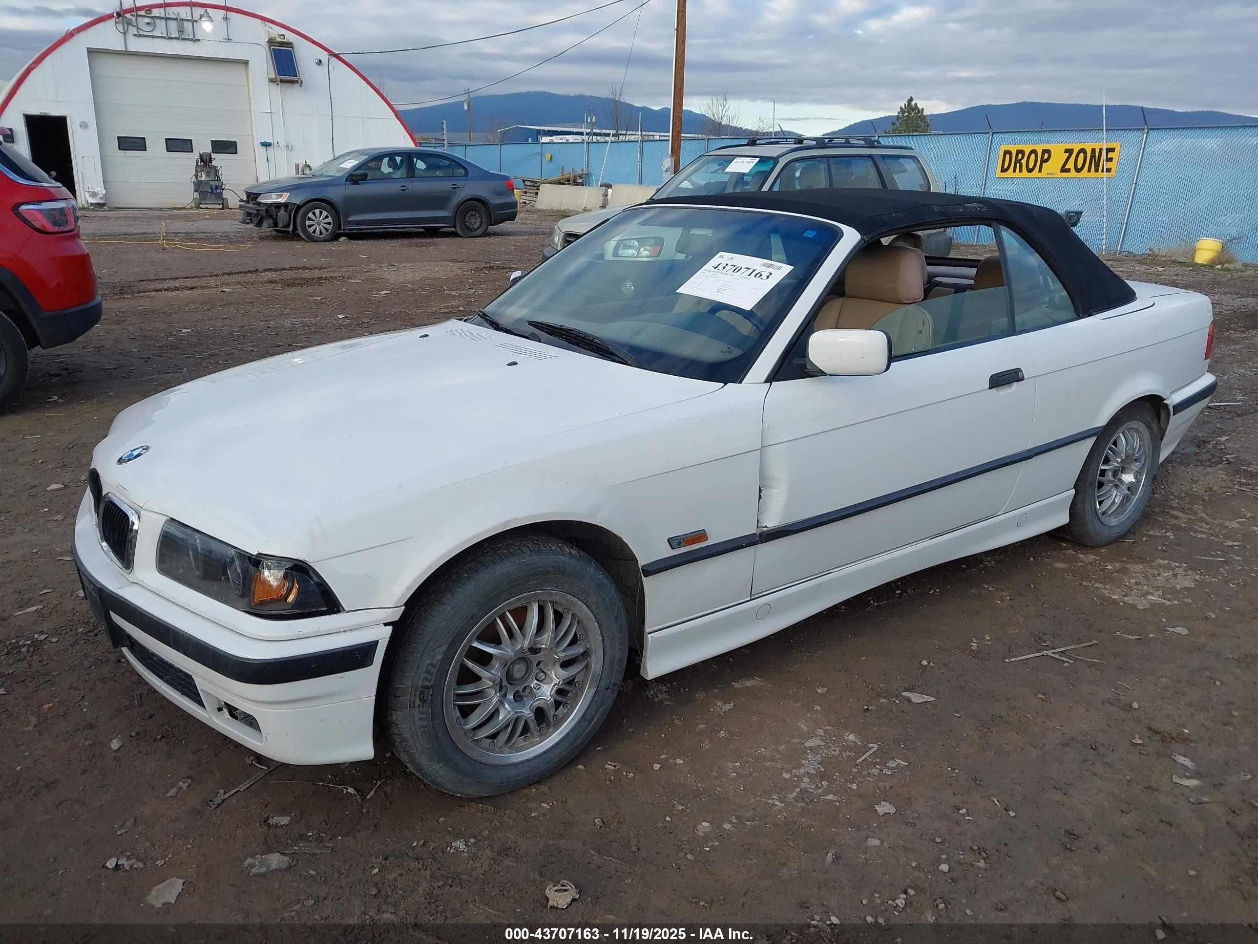 1999 Bmw 323ic   White vin: WBABJ8337XEM26109