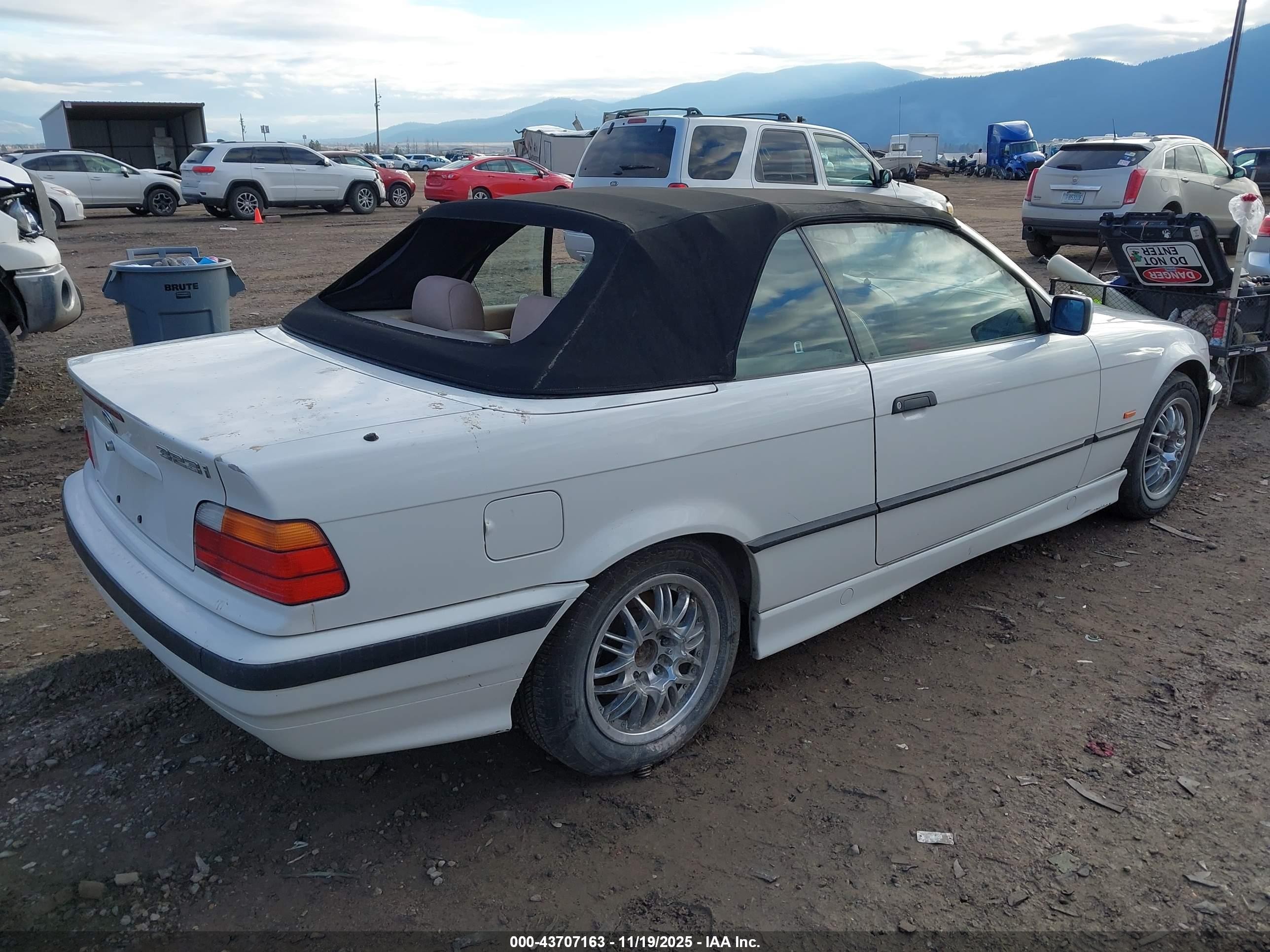 1999 Bmw 323ic   White vin: WBABJ8337XEM26109