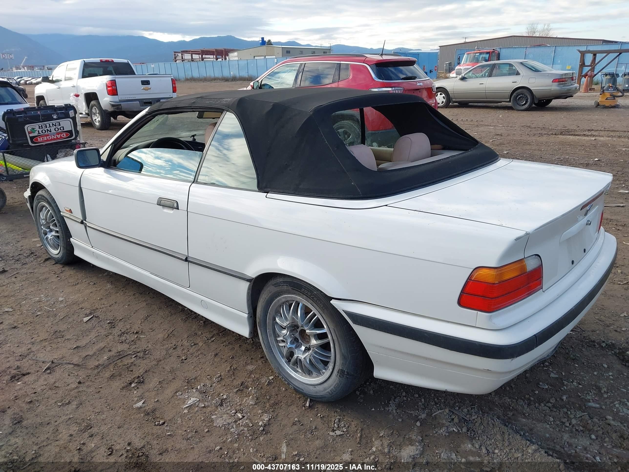 1999 Bmw 323ic   White vin: WBABJ8337XEM26109