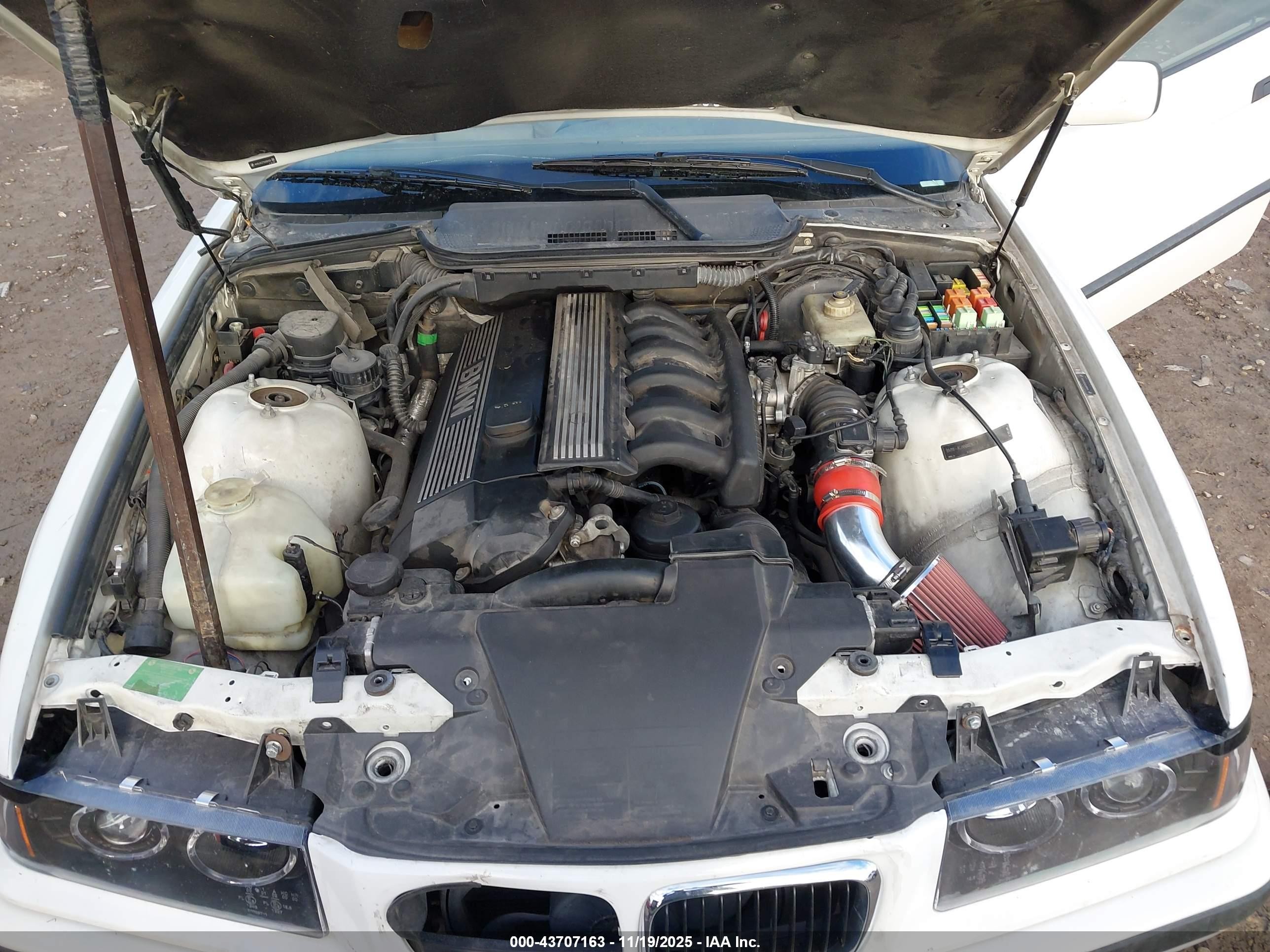 1999 Bmw 323ic   White vin: WBABJ8337XEM26109