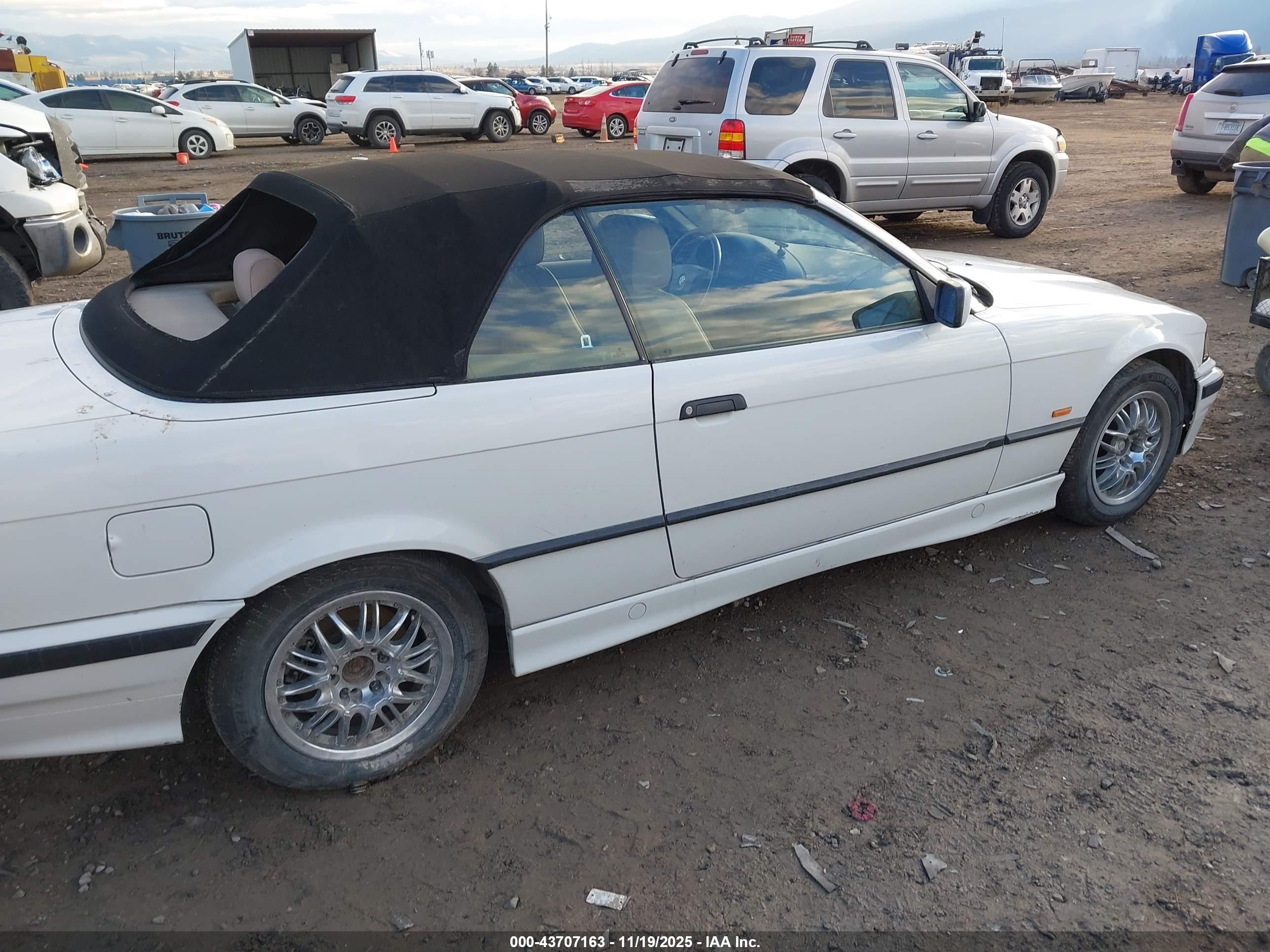 1999 Bmw 323ic   White vin: WBABJ8337XEM26109