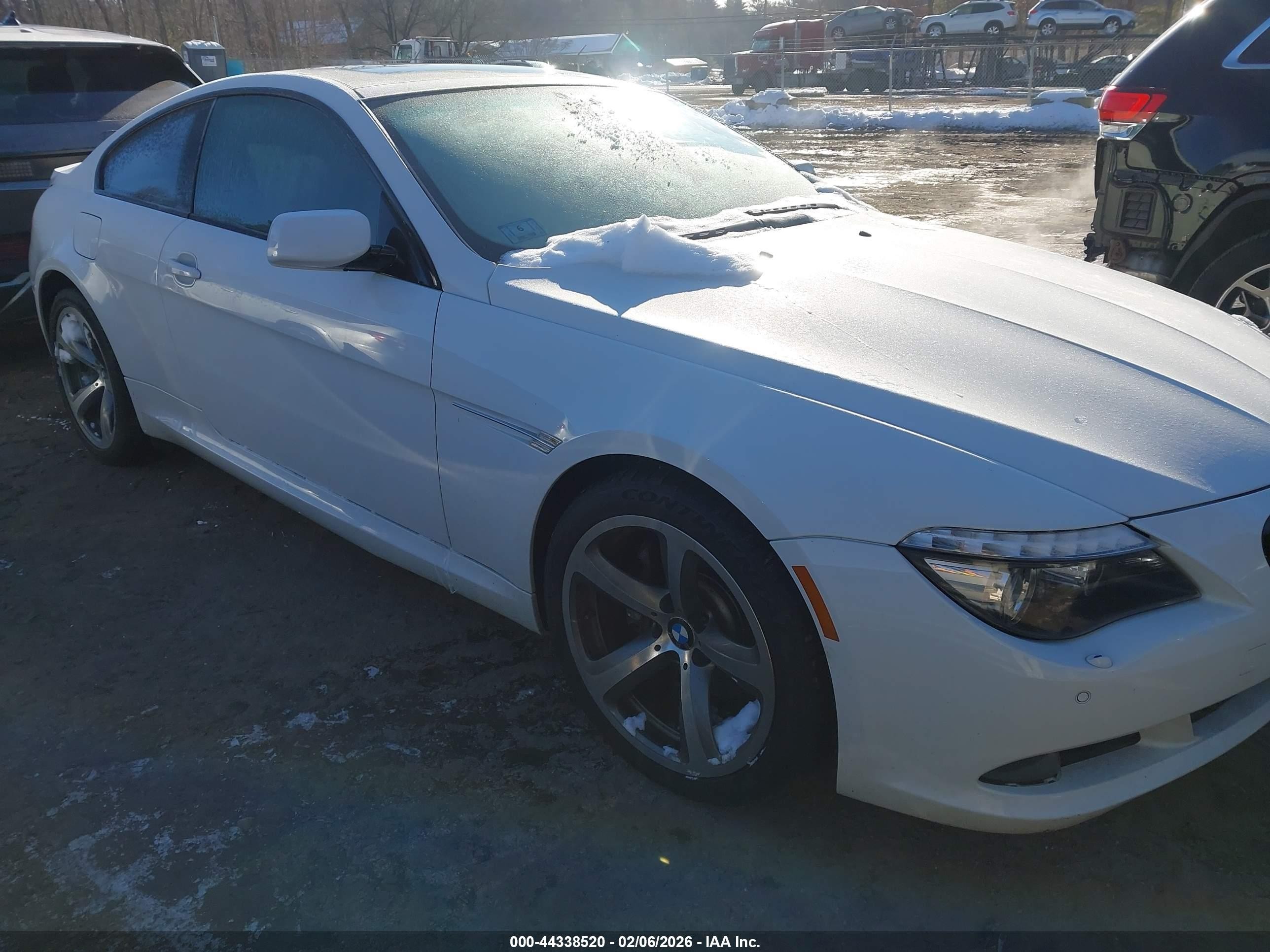 2009 Bmw 650i   White vin: WBAEA53539CV92008