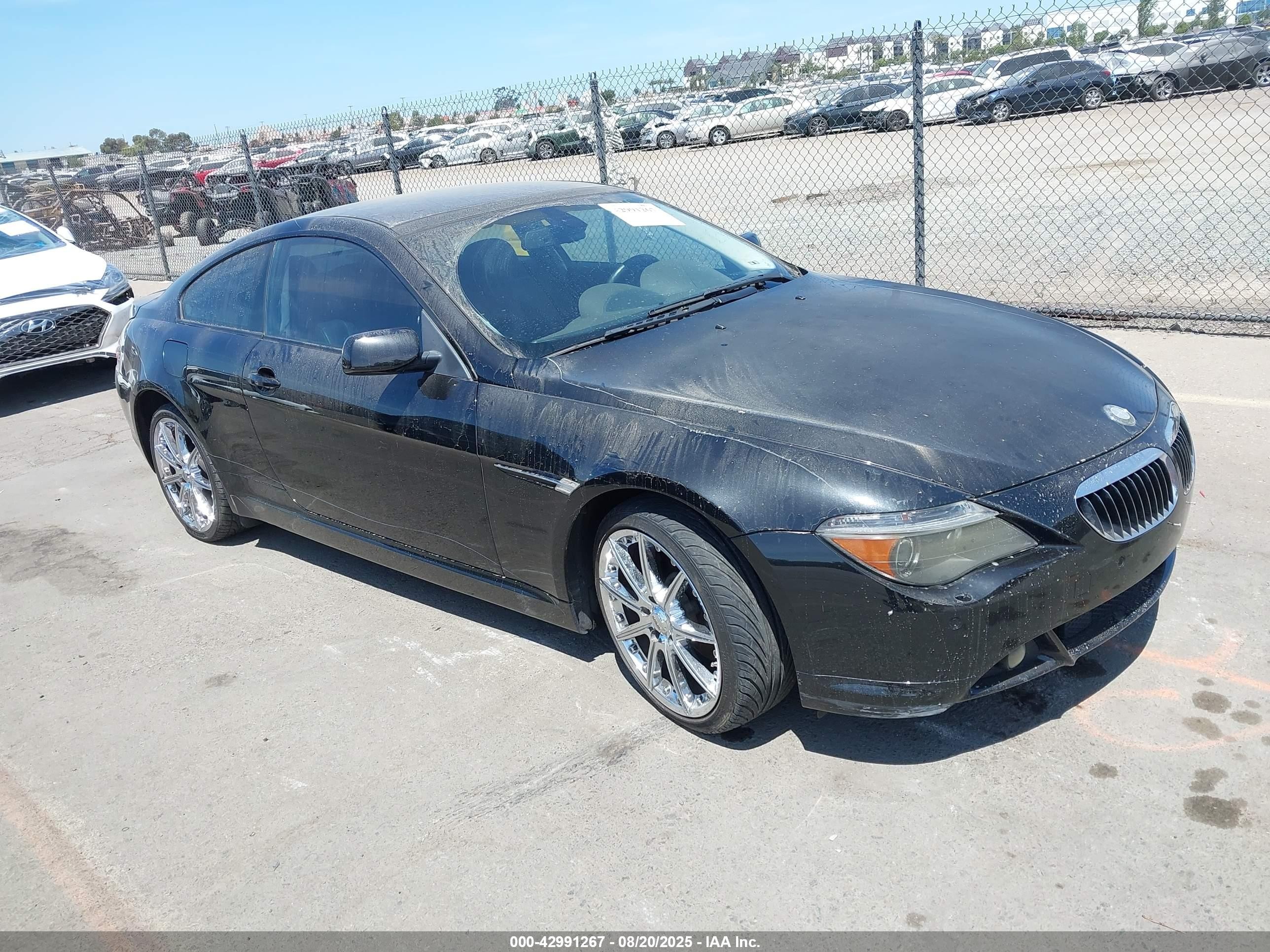 2004 Bmw 645ci   Black vin: WBAEH73484B190000