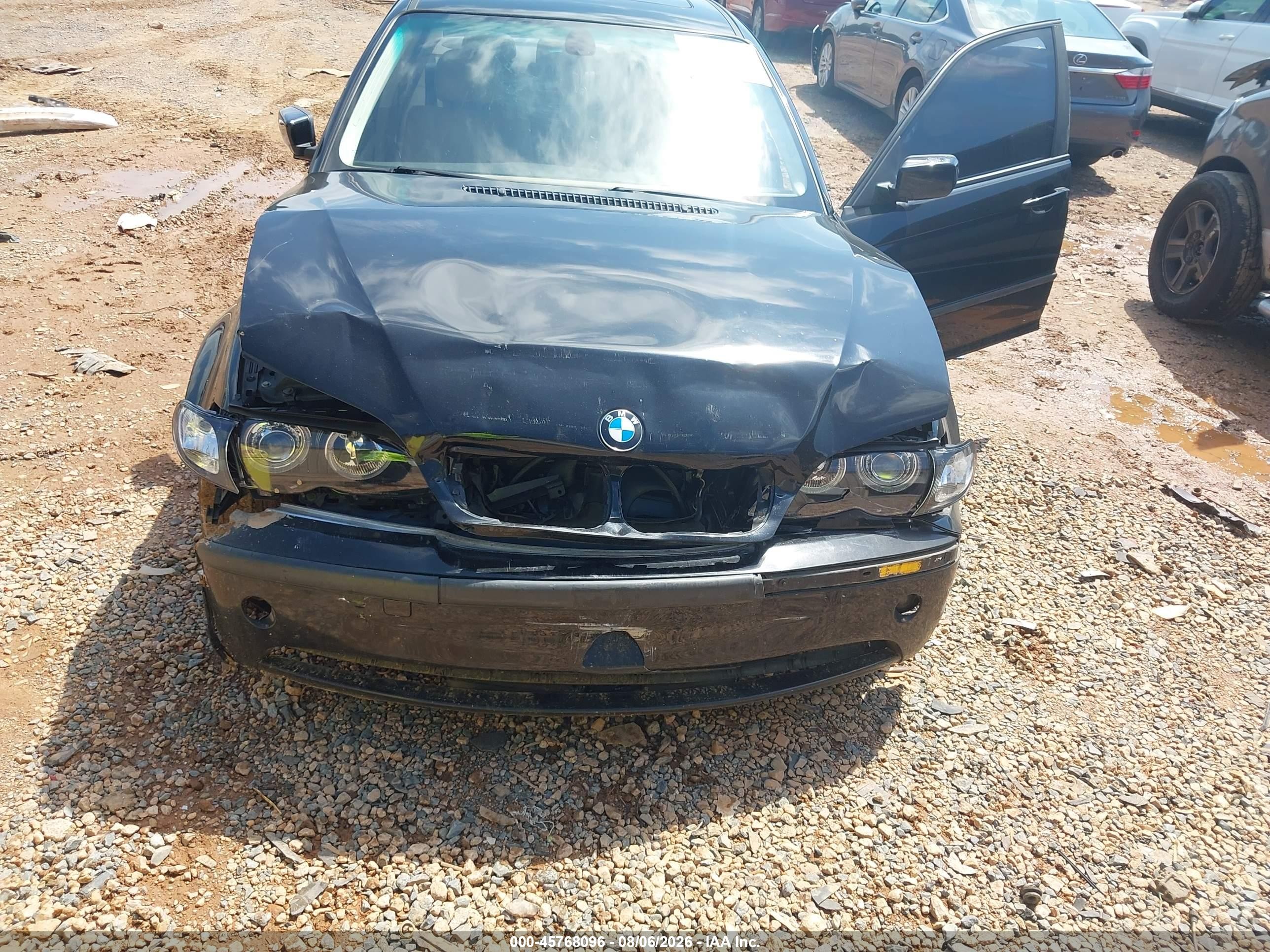 2004 Bmw 325i   Black vin: WBAET37474NJ83927
