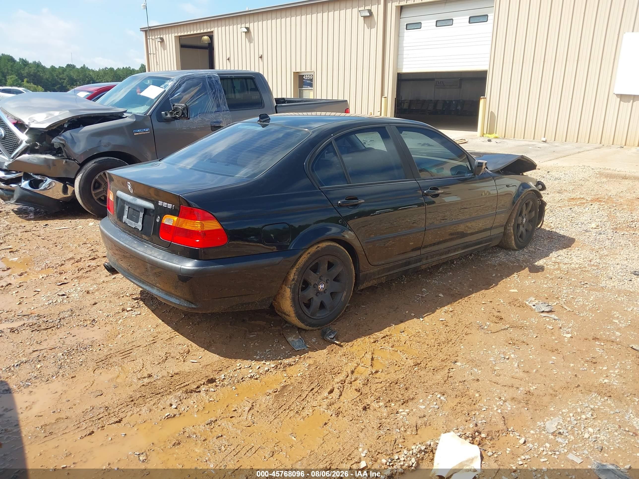2004 Bmw 325i   Black vin: WBAET37474NJ83927