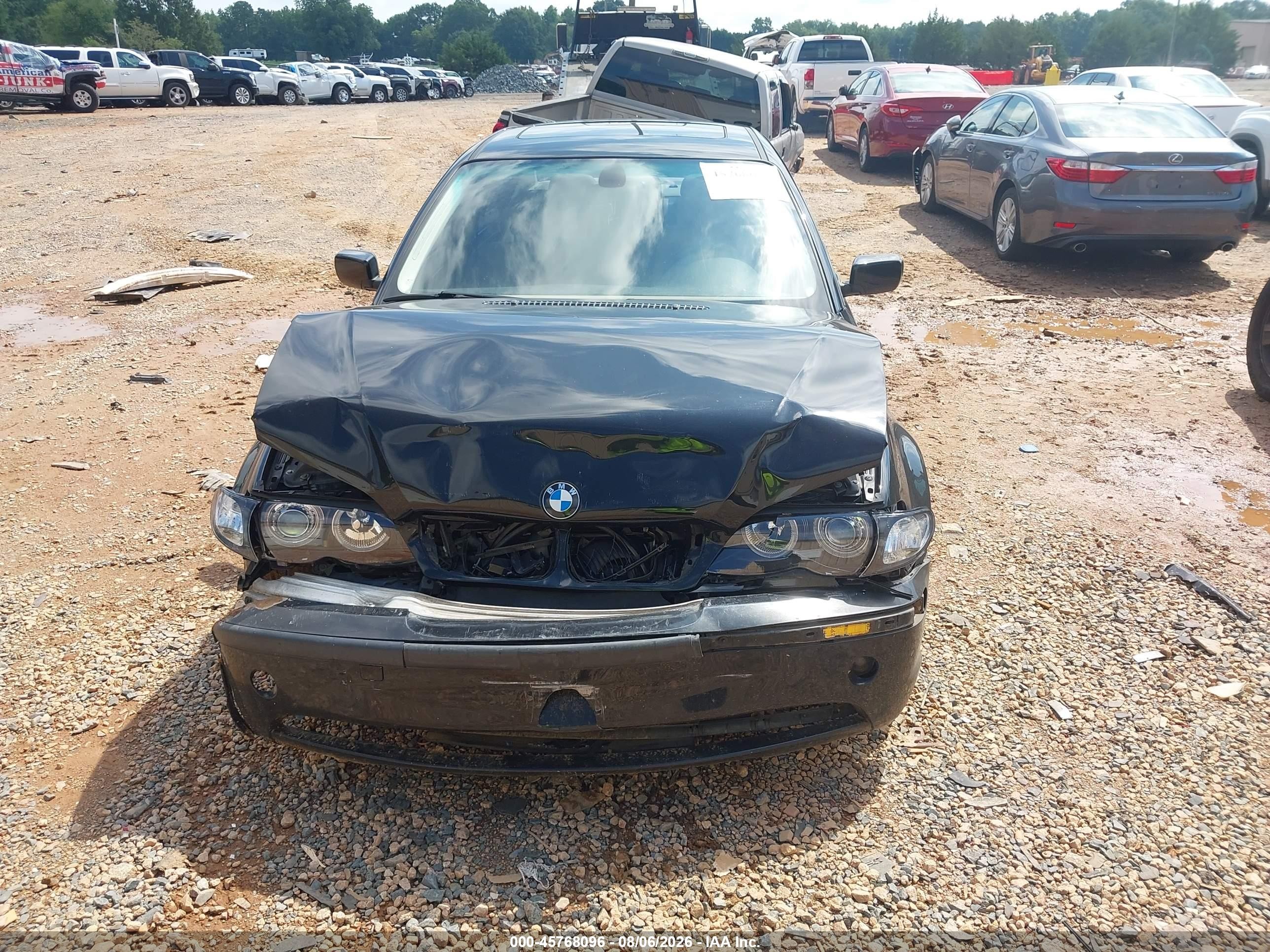 2004 Bmw 325i   Black vin: WBAET37474NJ83927