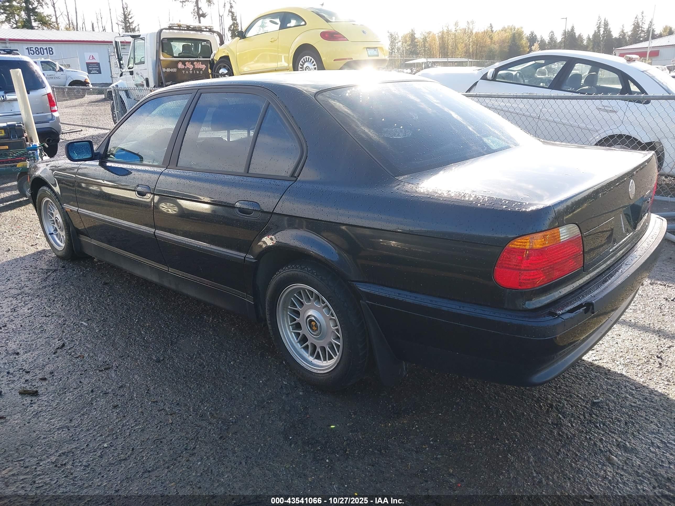 1999 Bmw 740ia   Black vin: WBAGG8333XDN73344