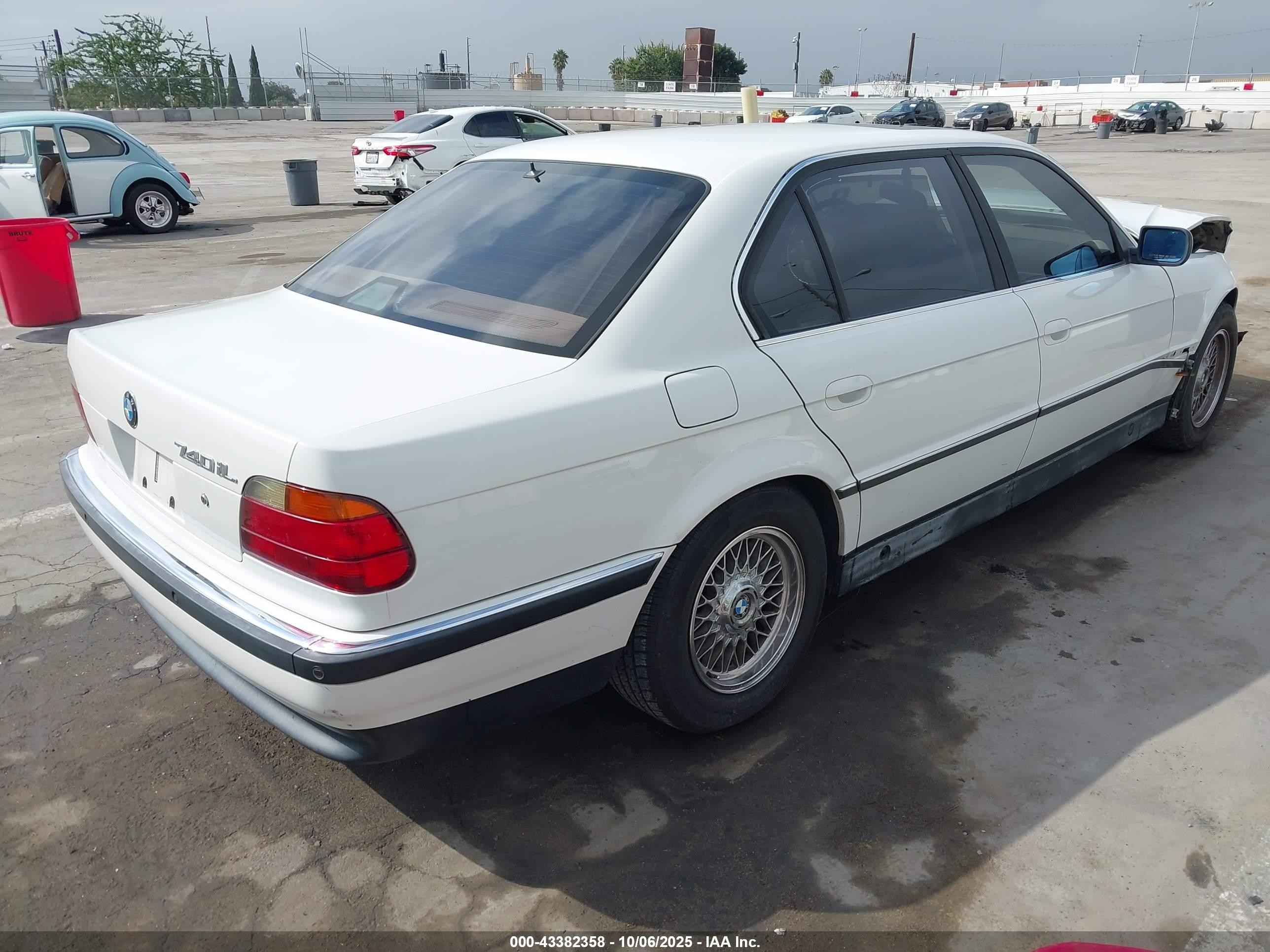 1998 Bmw 740il   White vin: WBAGJ8324WDM11763