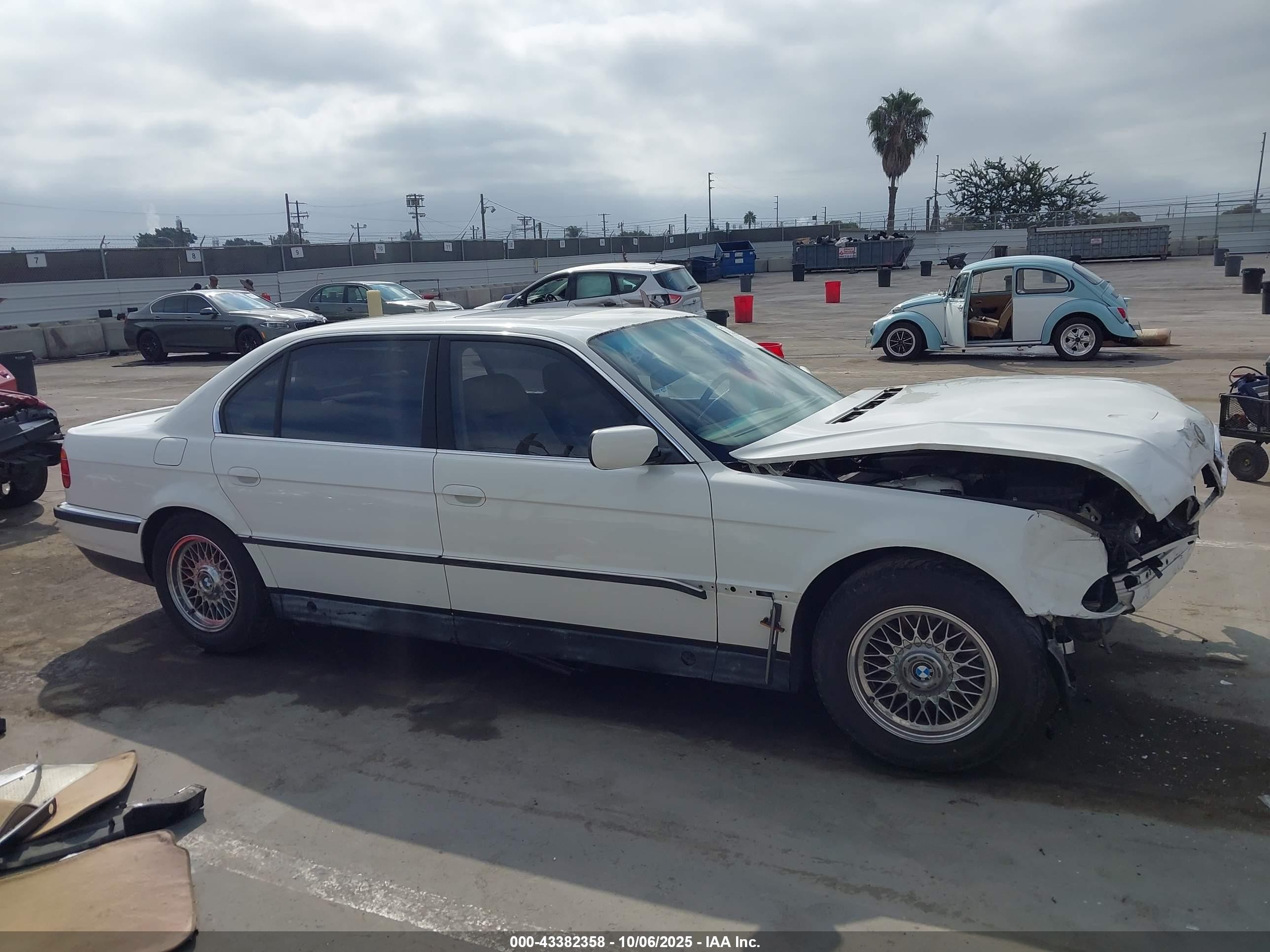 1998 Bmw 740il   White vin: WBAGJ8324WDM11763