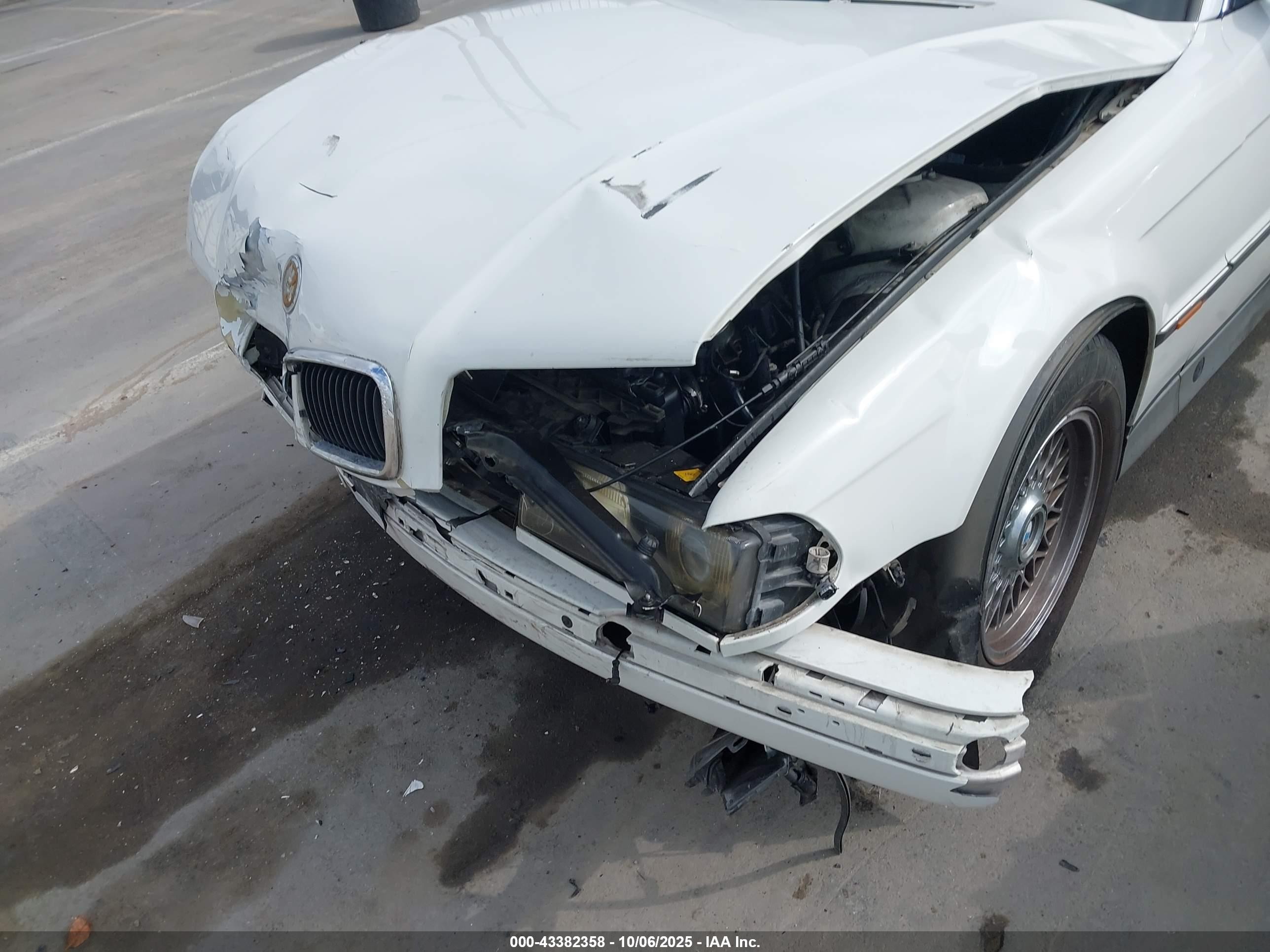 1998 Bmw 740il   White vin: WBAGJ8324WDM11763
