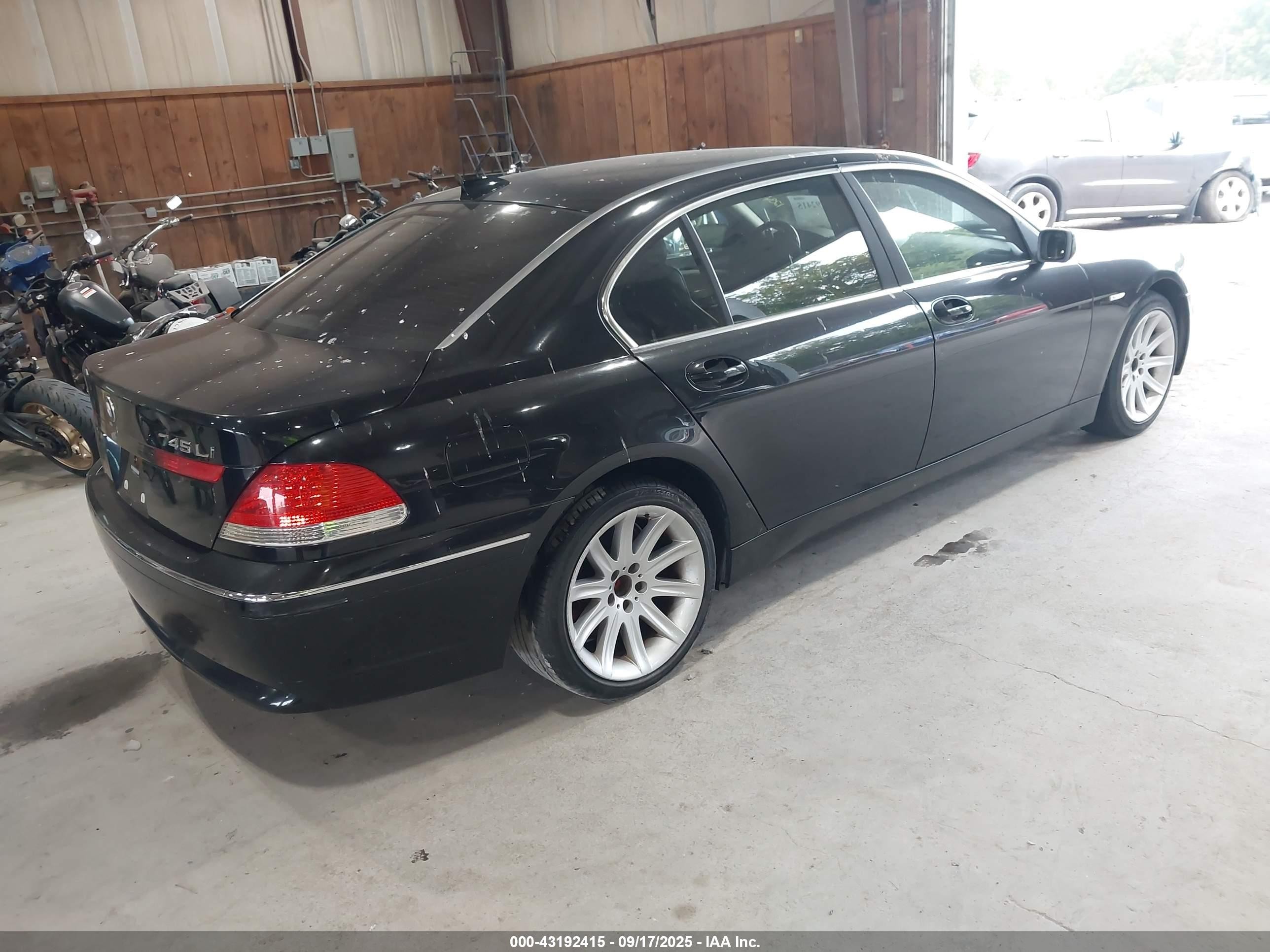2004 Bmw 745li   Black vin: WBAGN63494DS46140