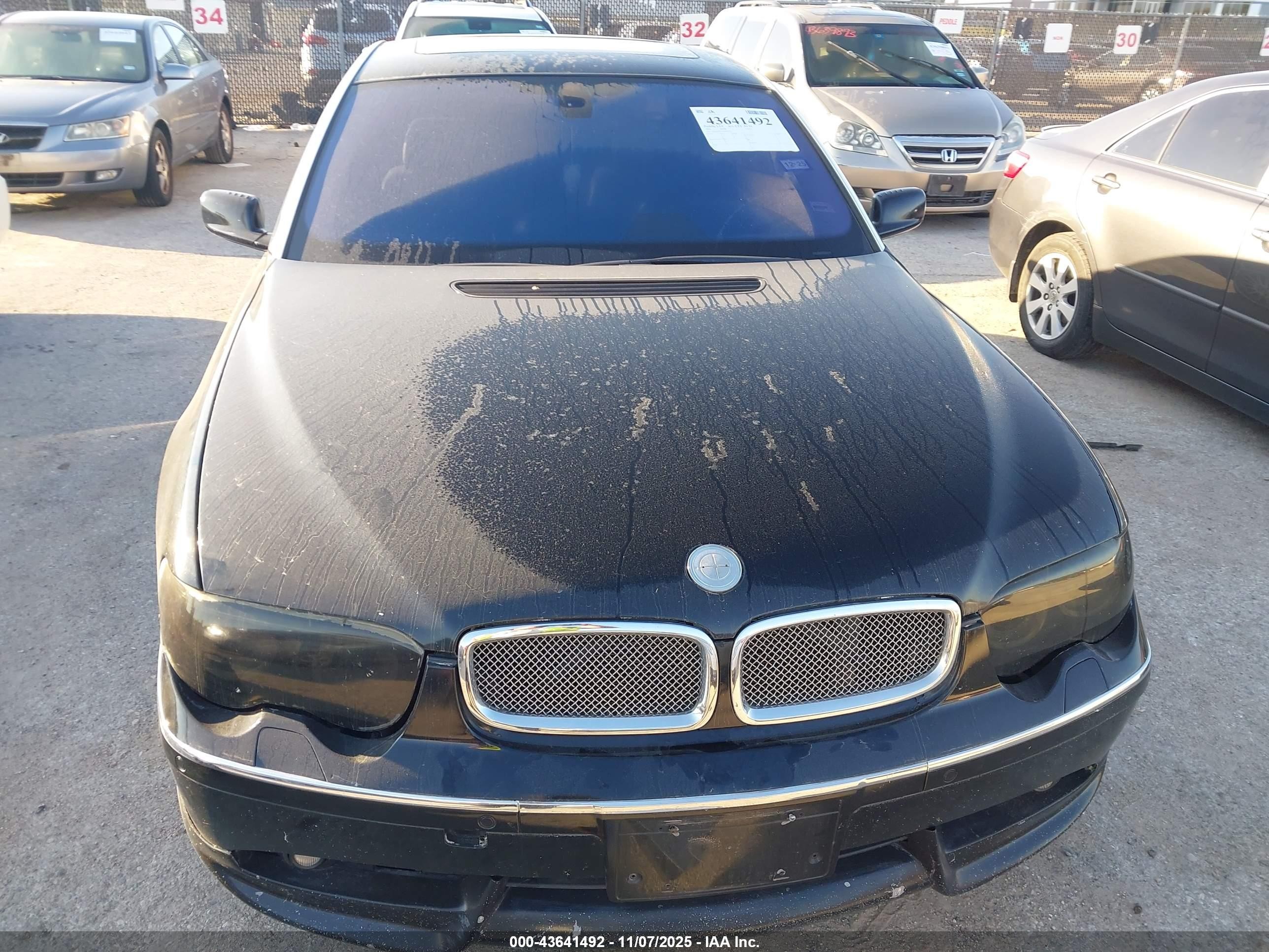 2004 Bmw 745li   Black vin: WBAGN63564DS54298