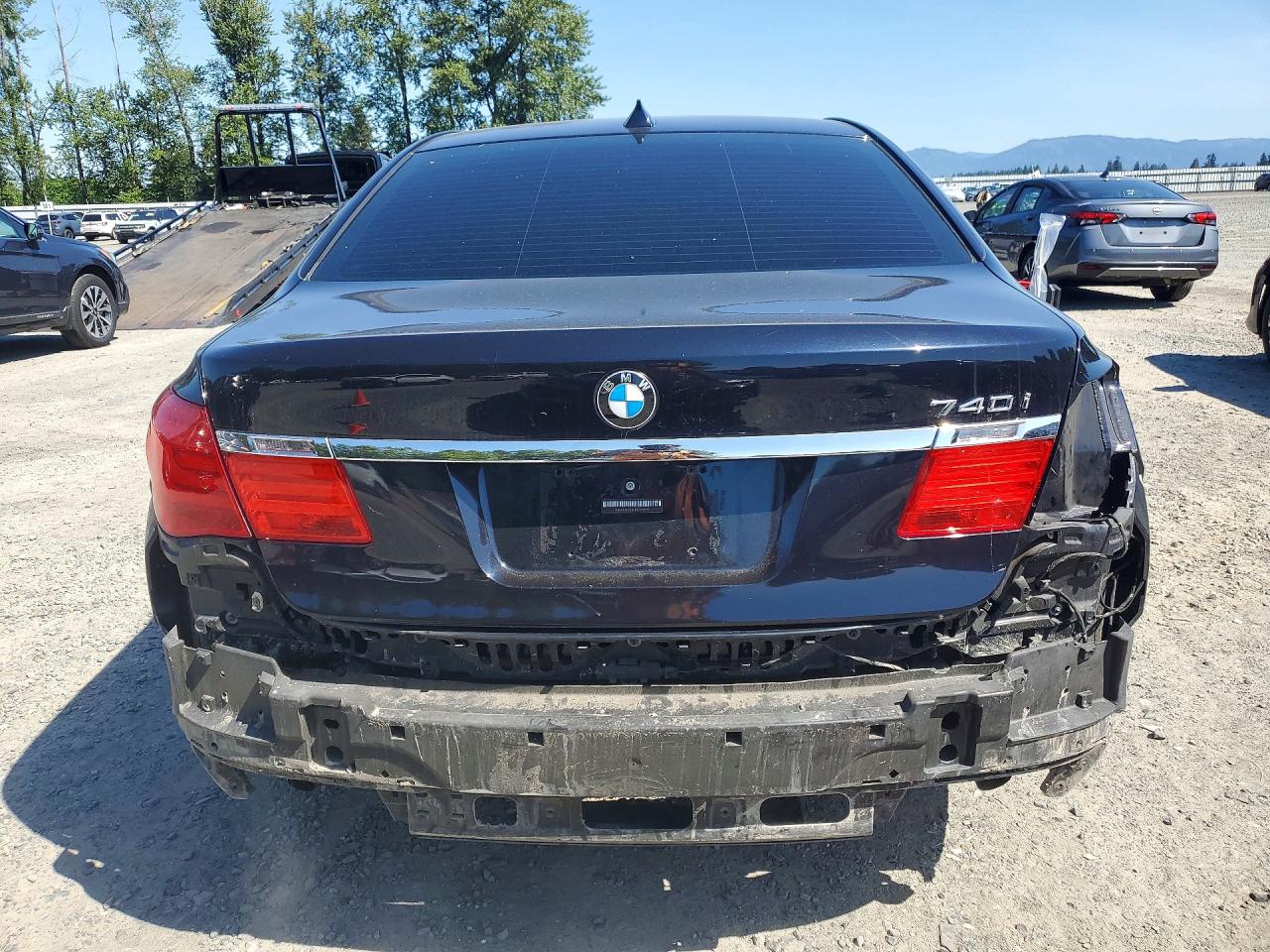 2011 Bmw 740 I Черный vin: WBAKA4C52BC392093