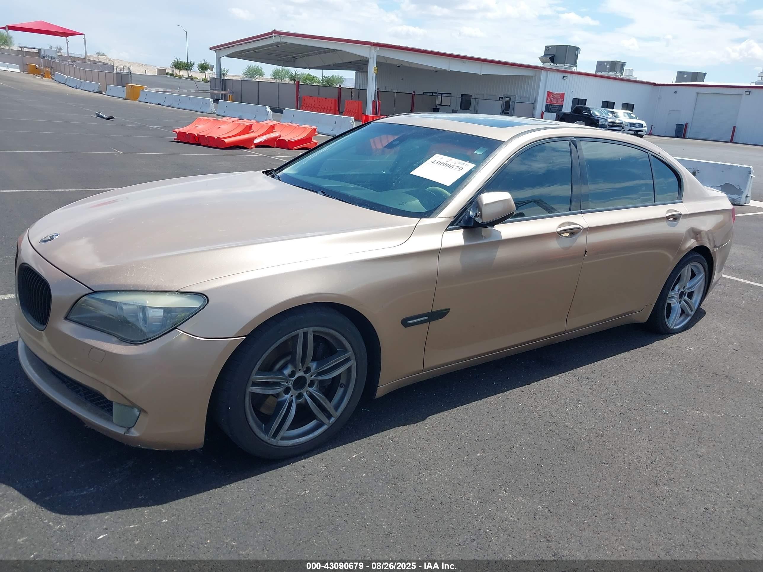 2009 Bmw 750li   Золотой vin: WBAKB83519CY60376