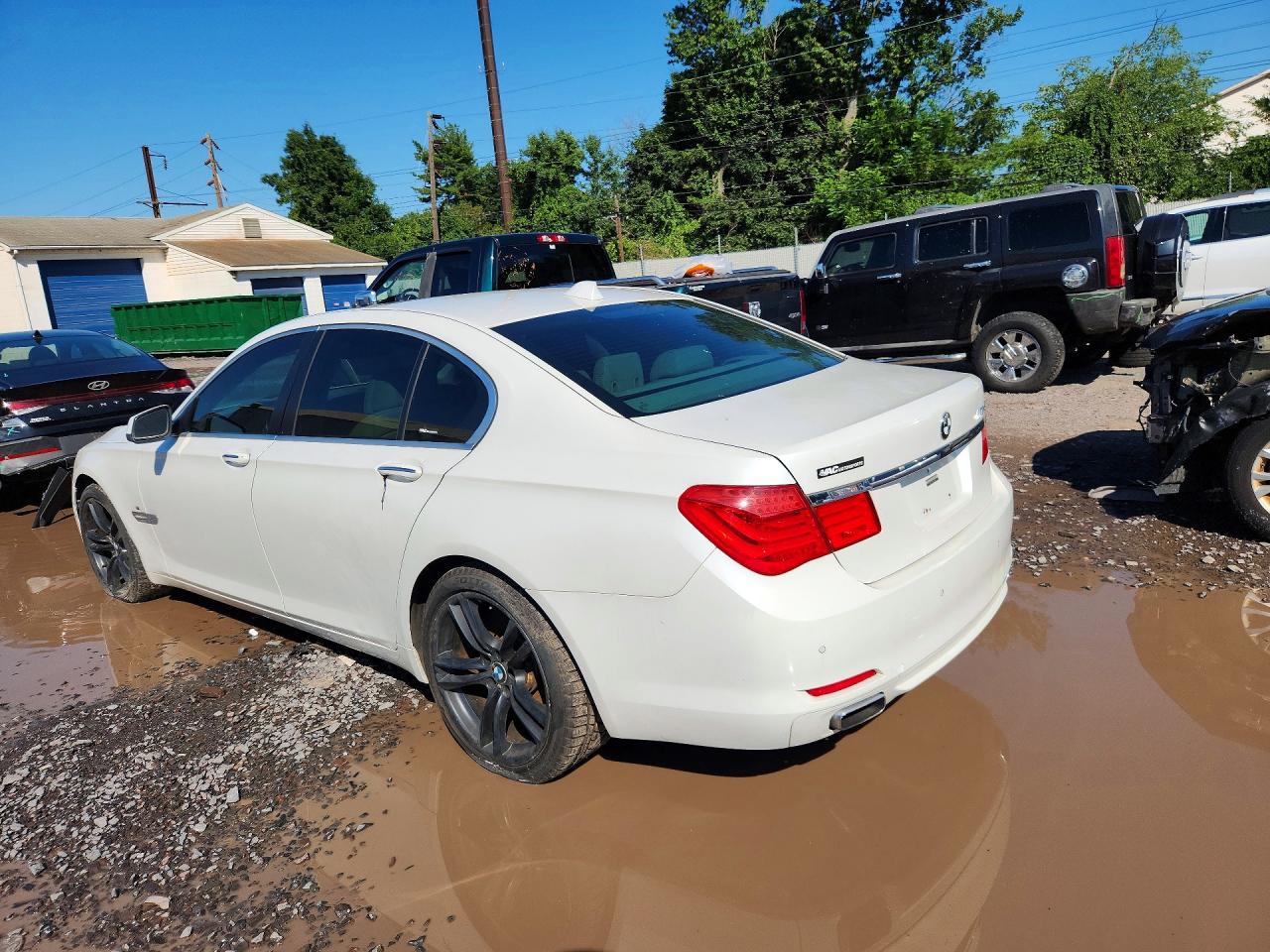 2010 Bmw 750 I Xdrive Белый vin: WBAKC6C55ACL67838