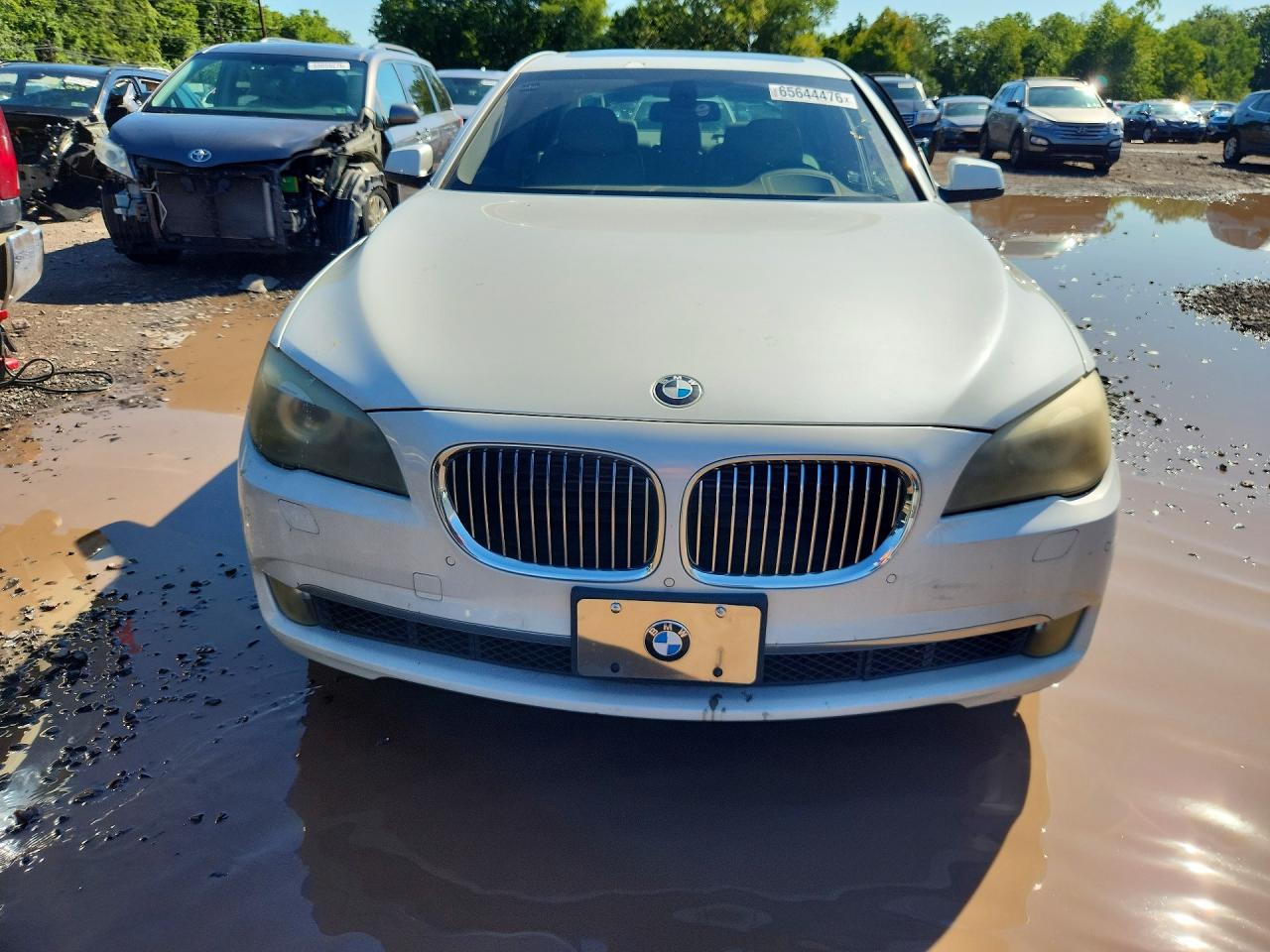 2010 Bmw 750 I Xdrive Белый vin: WBAKC6C55ACL67838