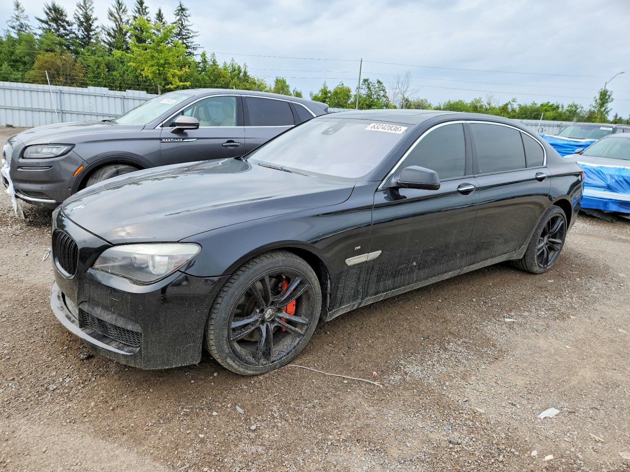 2011 Bmw 750 Lxi Черный vin: WBAKC8C51BC433184