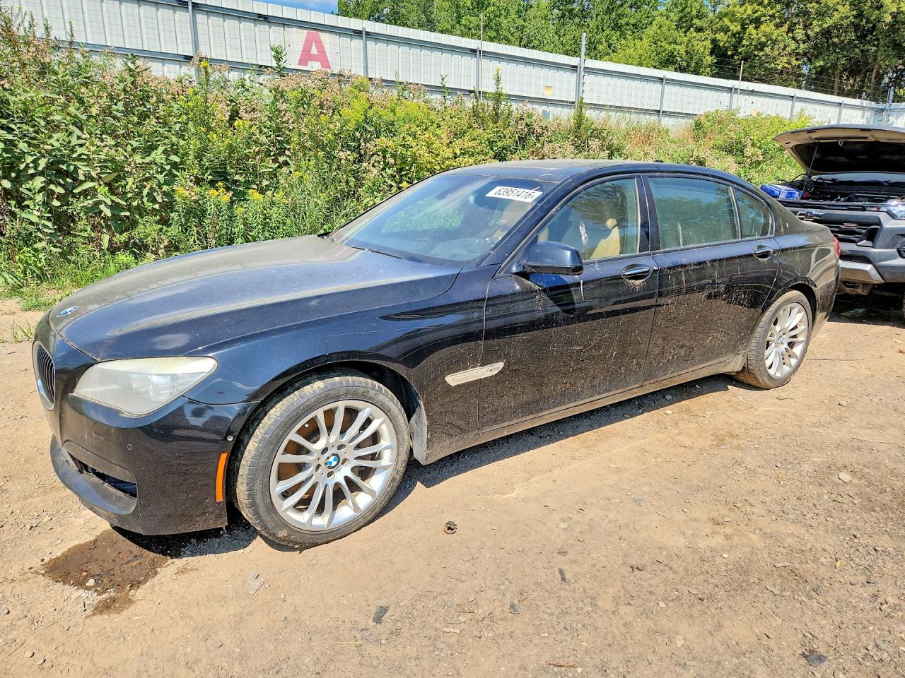 2012 Bmw 750 Lxi Черный vin: WBAKC8C51CC437706