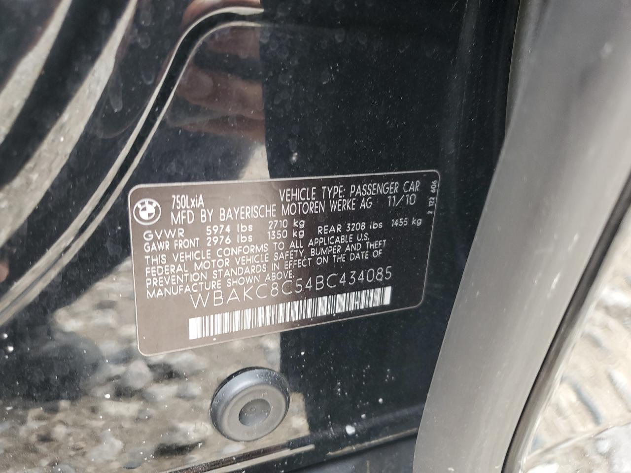 2011 Bmw 750 Lxi Черный vin: WBAKC8C54BC434085