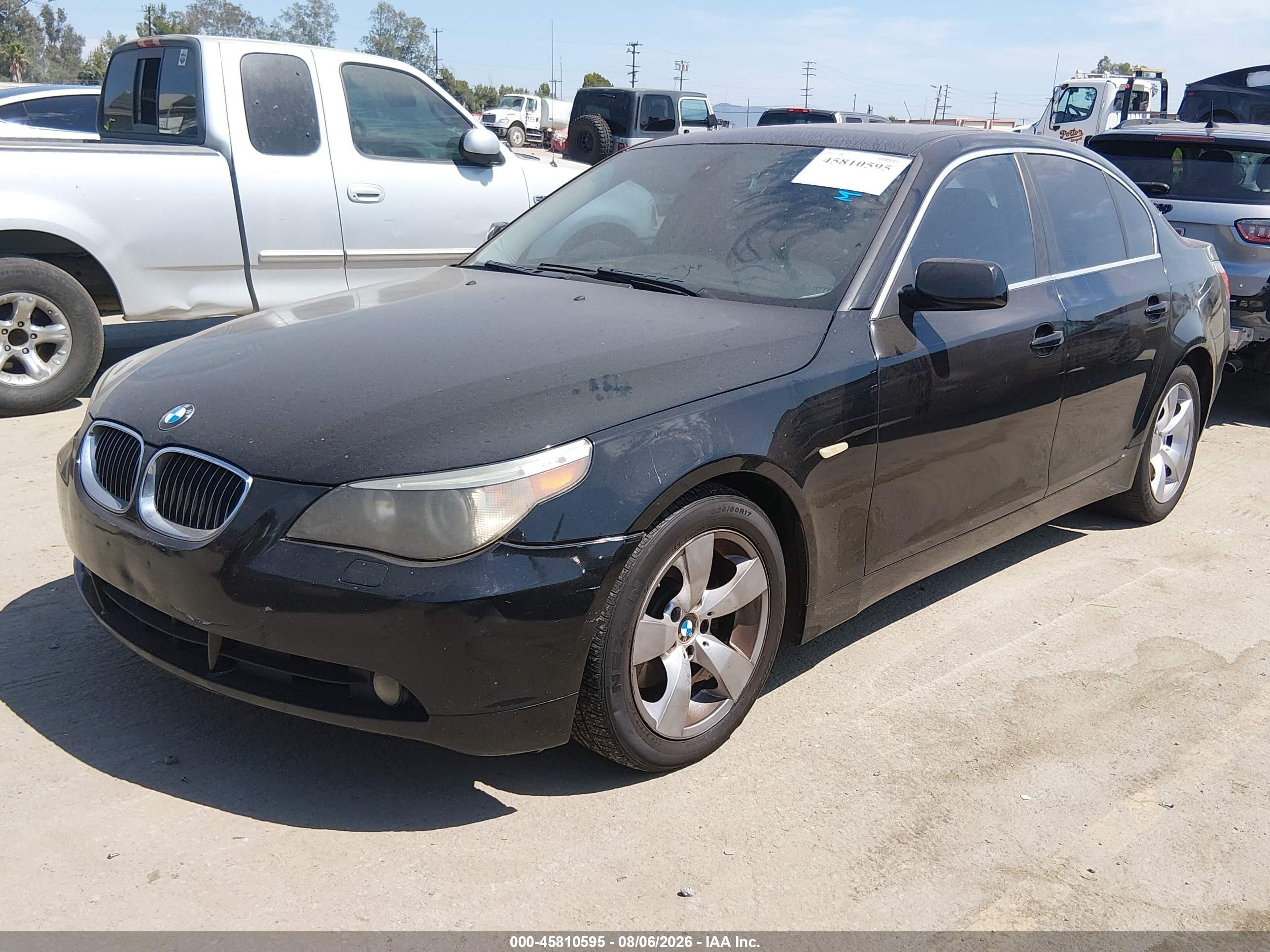 2007 Bmw 525i   Black vin: WBANE53507CW60105