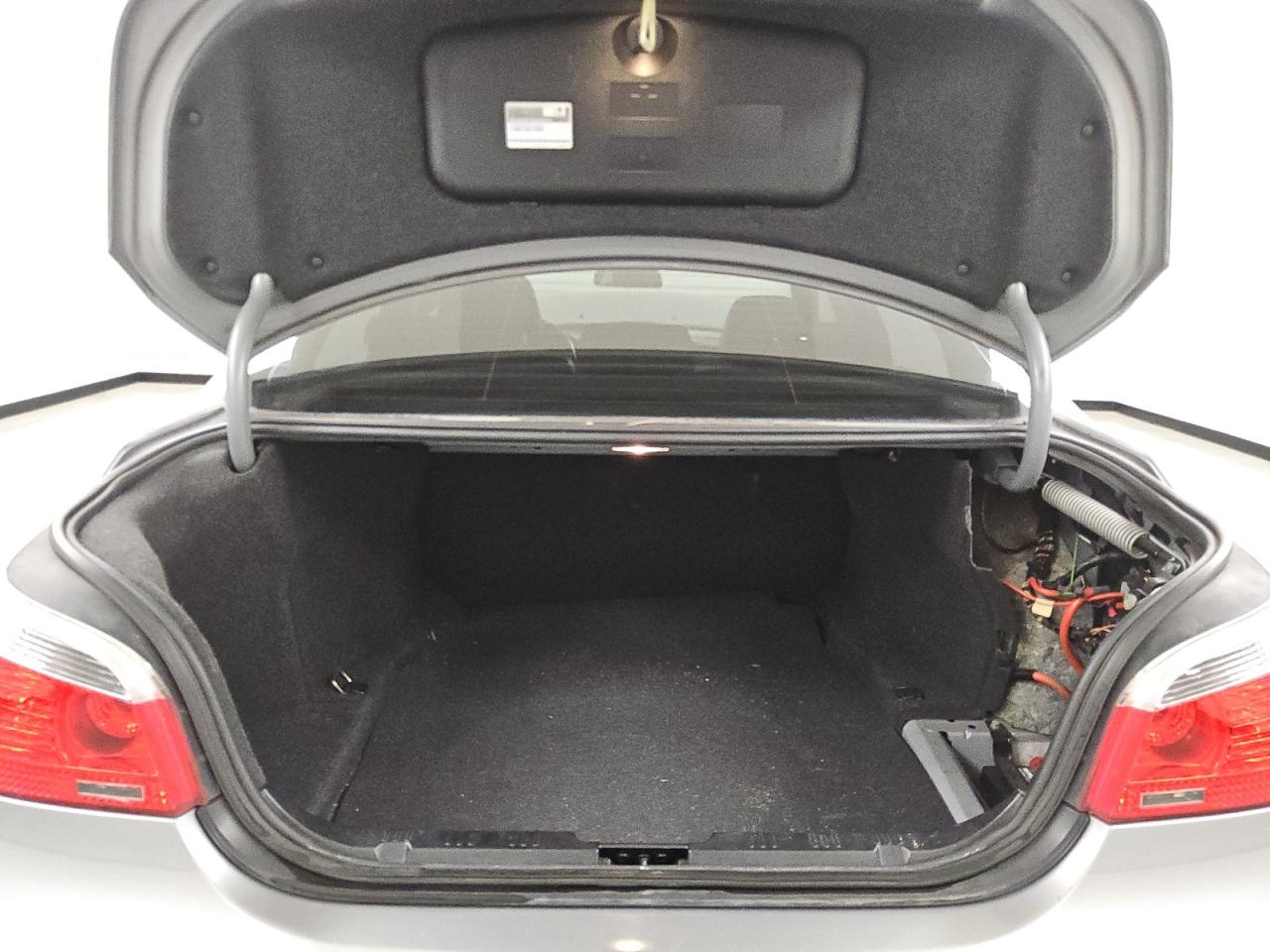 2007 Bmw 530 I Silver vin: WBANE73557CM57500 Damage: Trunk Trim, Missing, Replacement Required