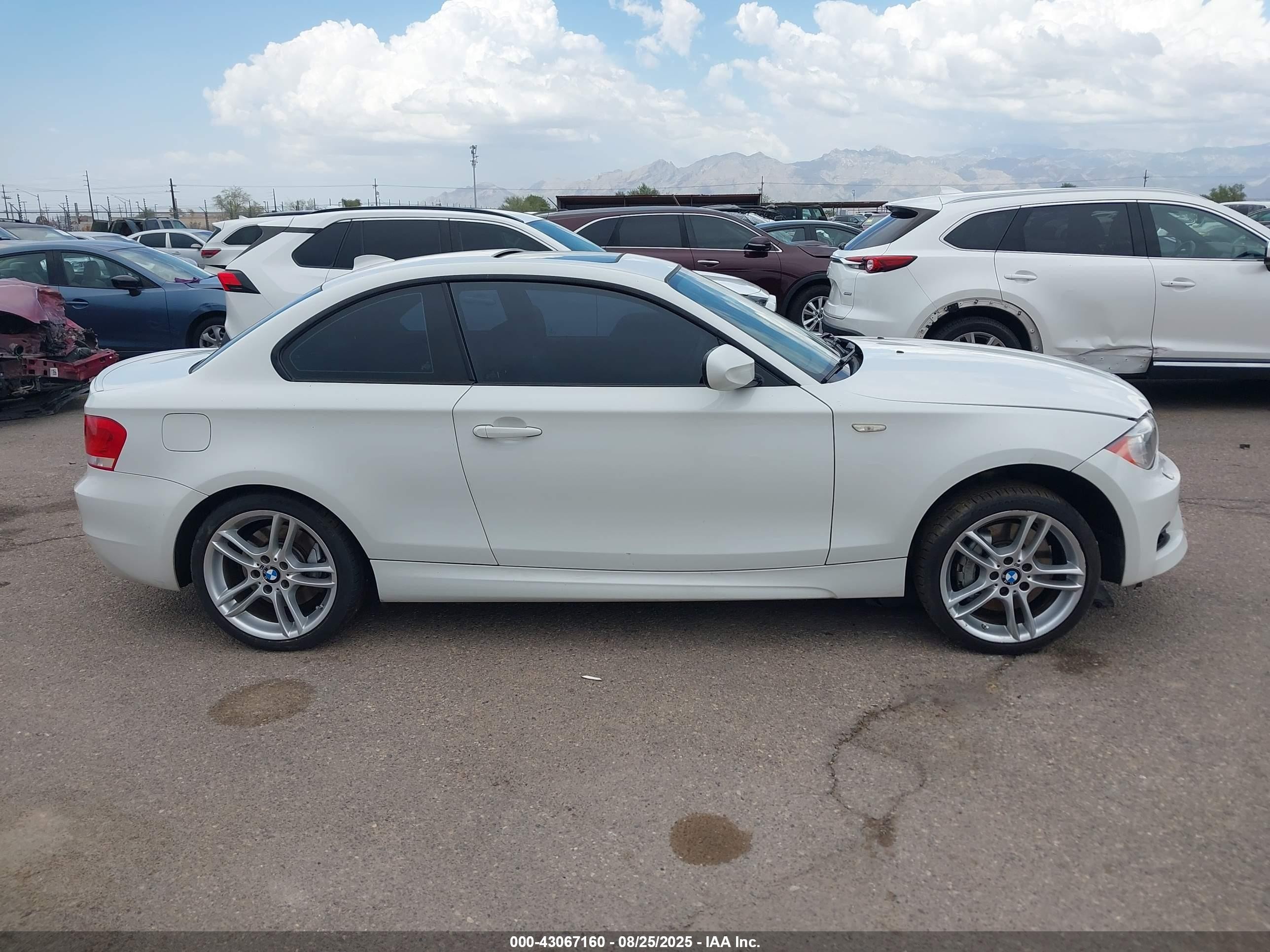 2012 Bmw 135i   White vin: WBAUC9C51CVM12968