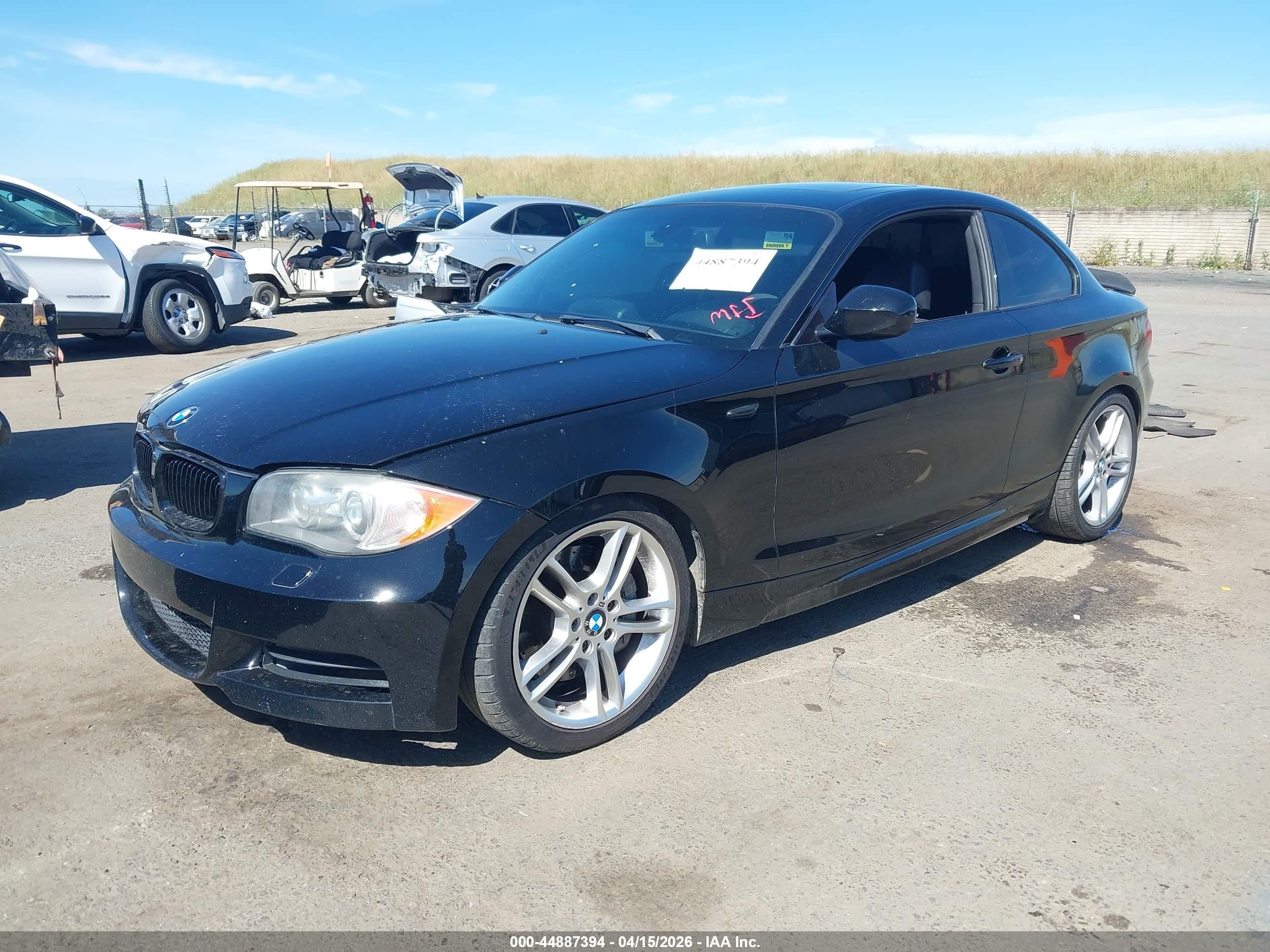 2011 Bmw 135i   Black vin: WBAUC9C55BVM11076
