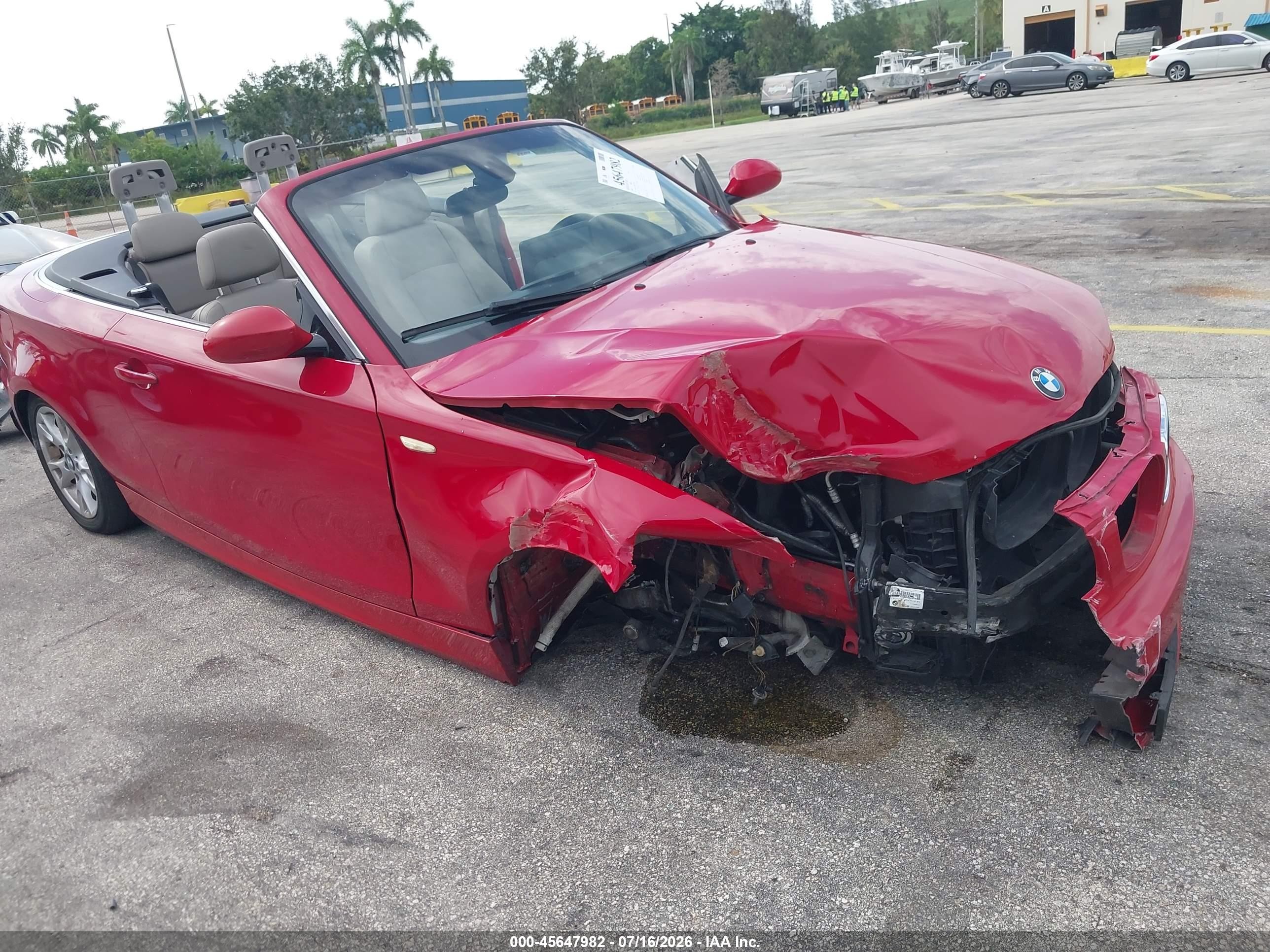 2009 Bmw 128i   Red vin: WBAUL735X9VJ75359