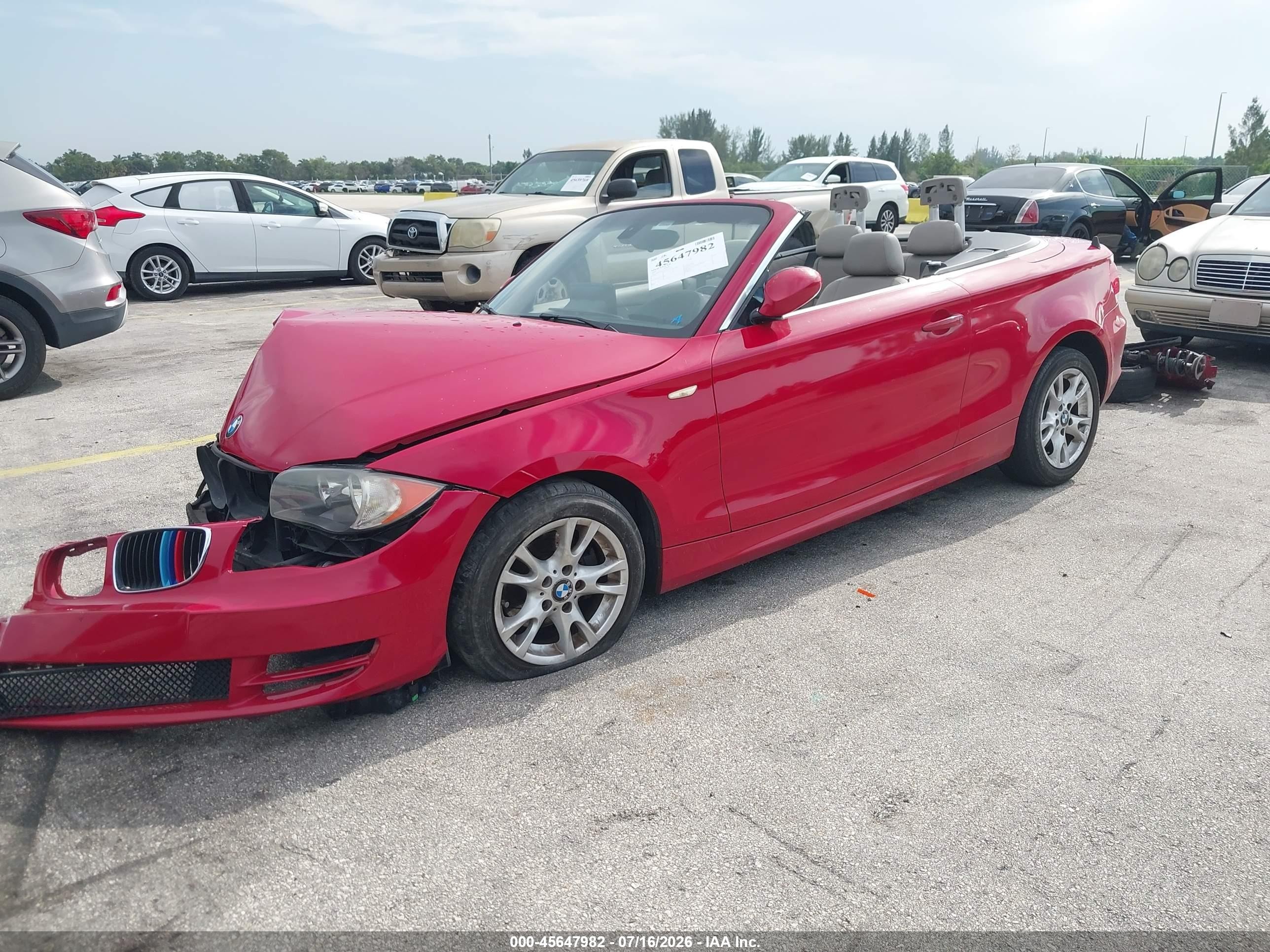 2009 Bmw 128i   Red vin: WBAUL735X9VJ75359