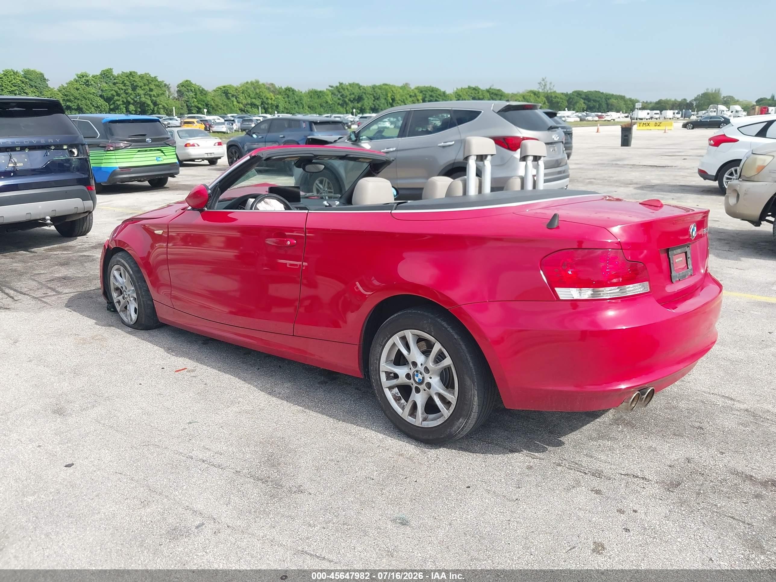 2009 Bmw 128i   Red vin: WBAUL735X9VJ75359