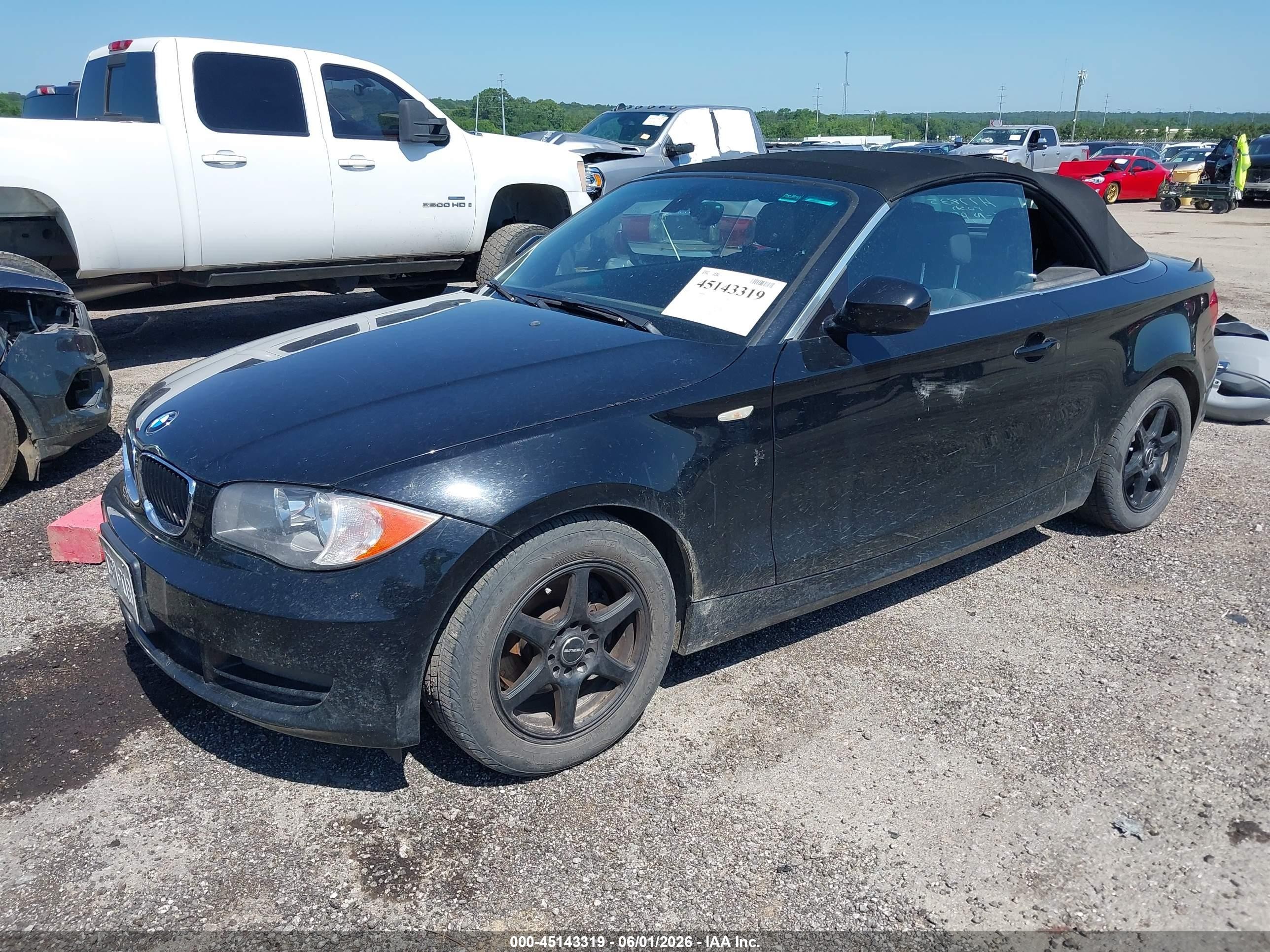 2010 Bmw 128i   Black vin: WBAUN1C54AVH77835