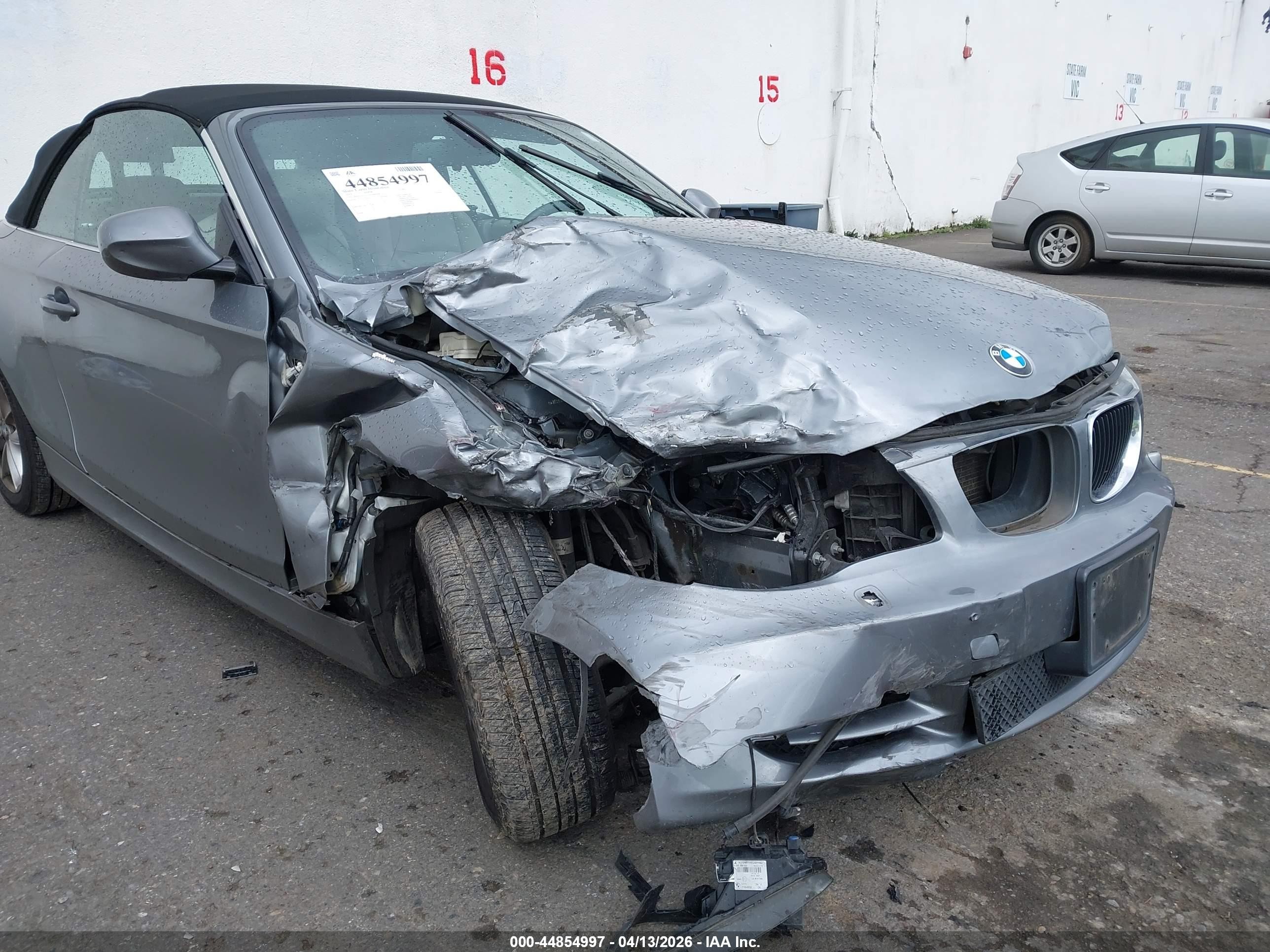2011 Bmw 128i   Silver vin: WBAUN1C57BVH82996