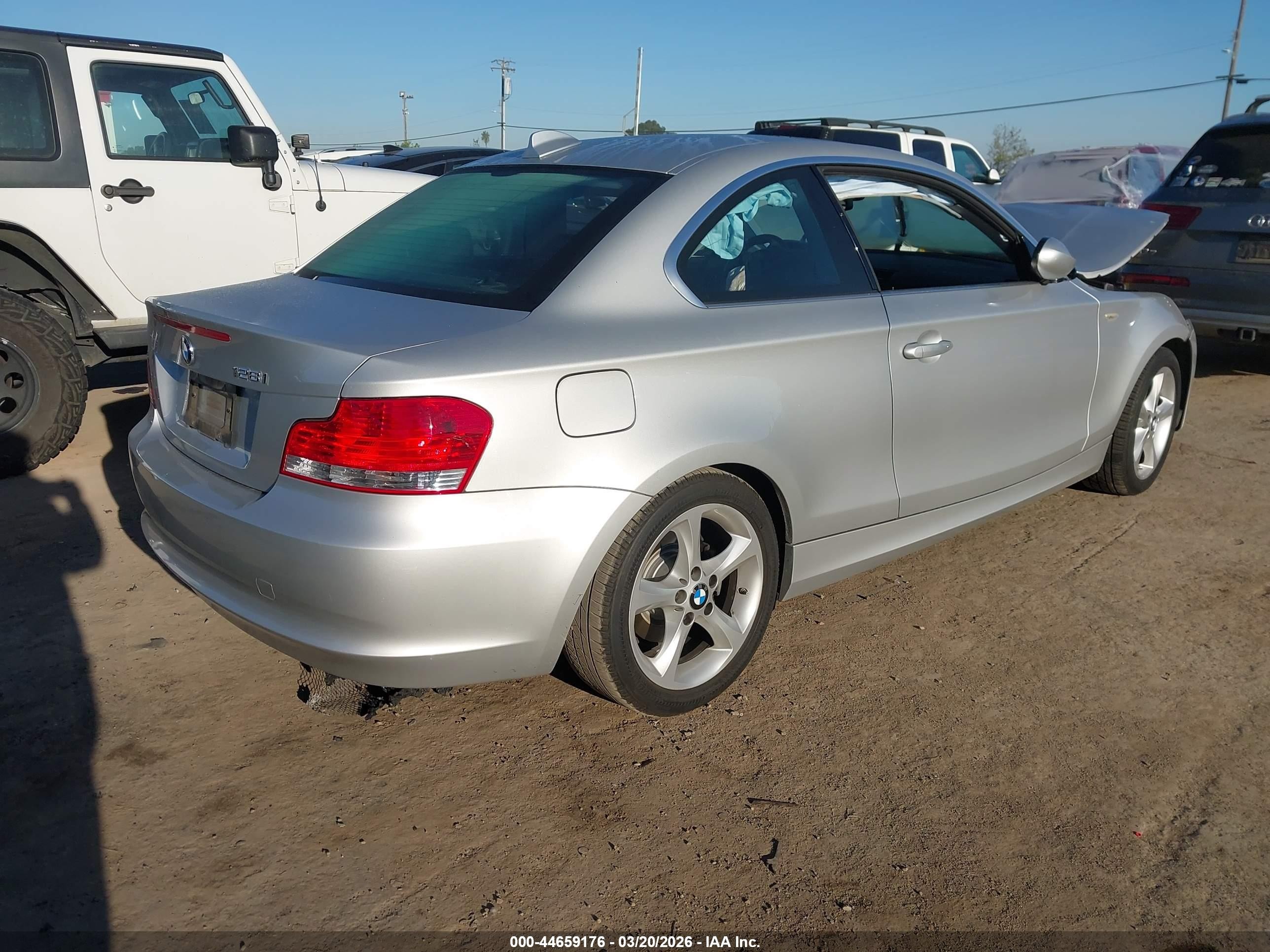 2009 Bmw 128i   Silver vin: WBAUP73529VK75590