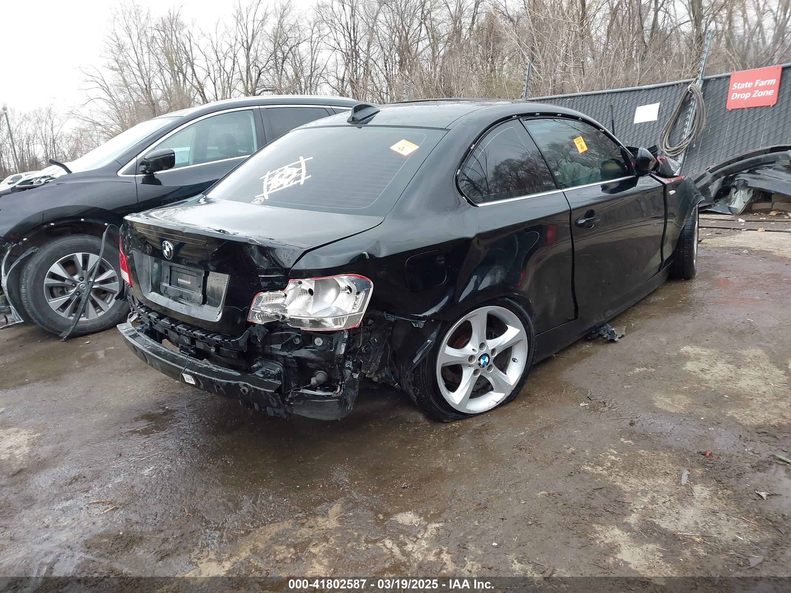 2010 Bmw 128i   Black vin: WBAUP7C56AVK77377