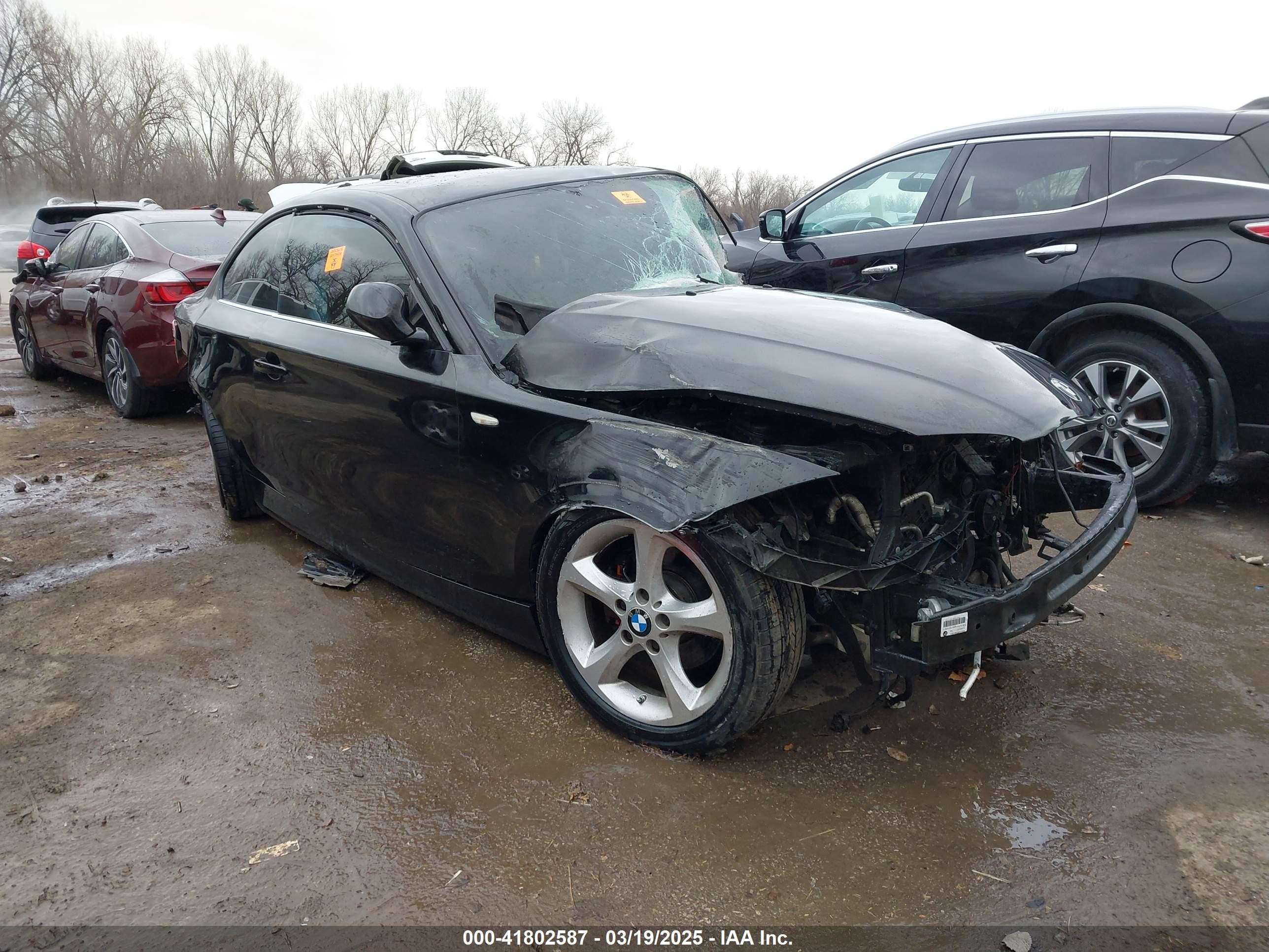2010 Bmw 128i   Black vin: WBAUP7C56AVK77377