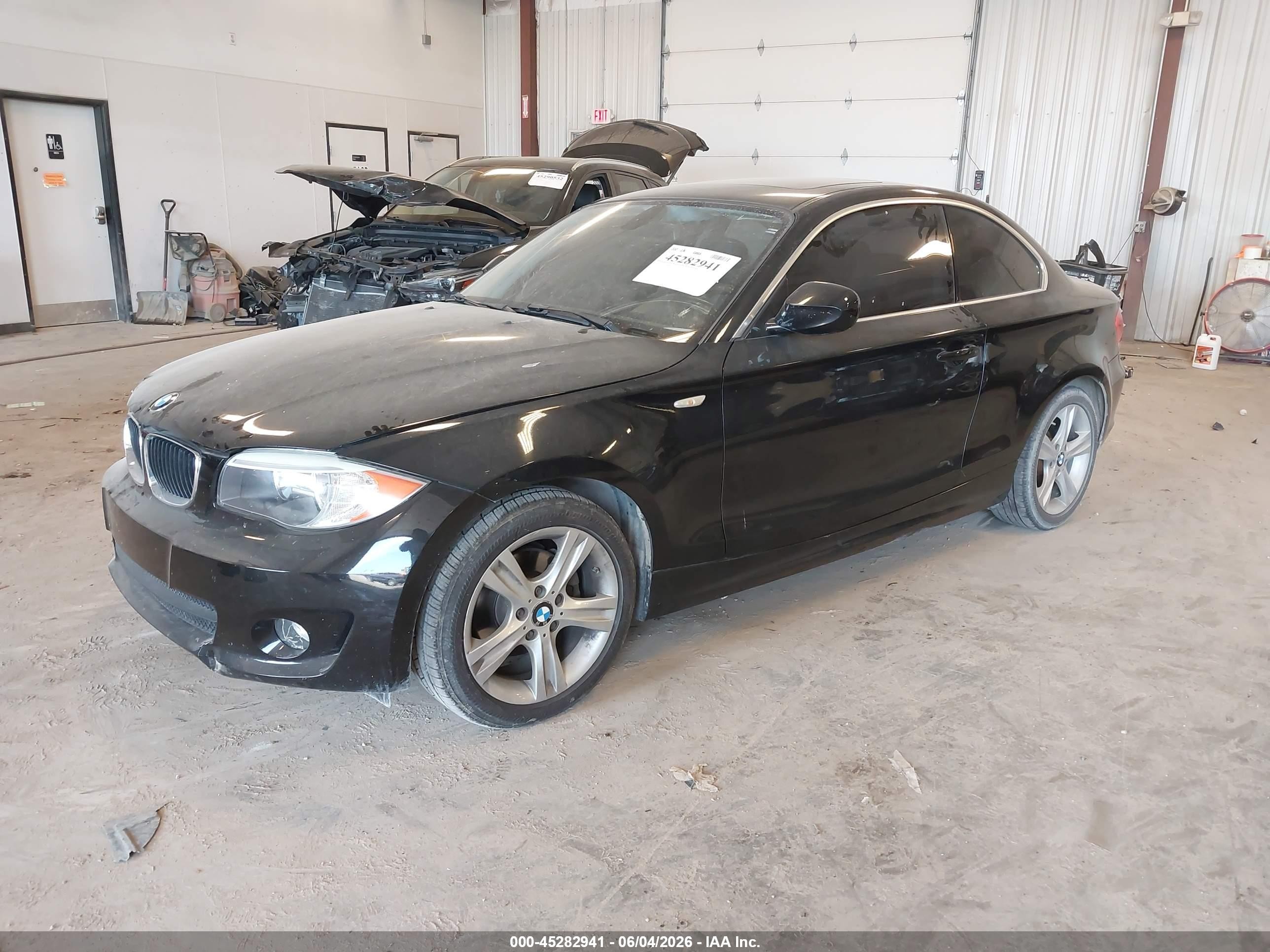 2012 Bmw 128i   Черный vin: WBAUP7C56CVP22736