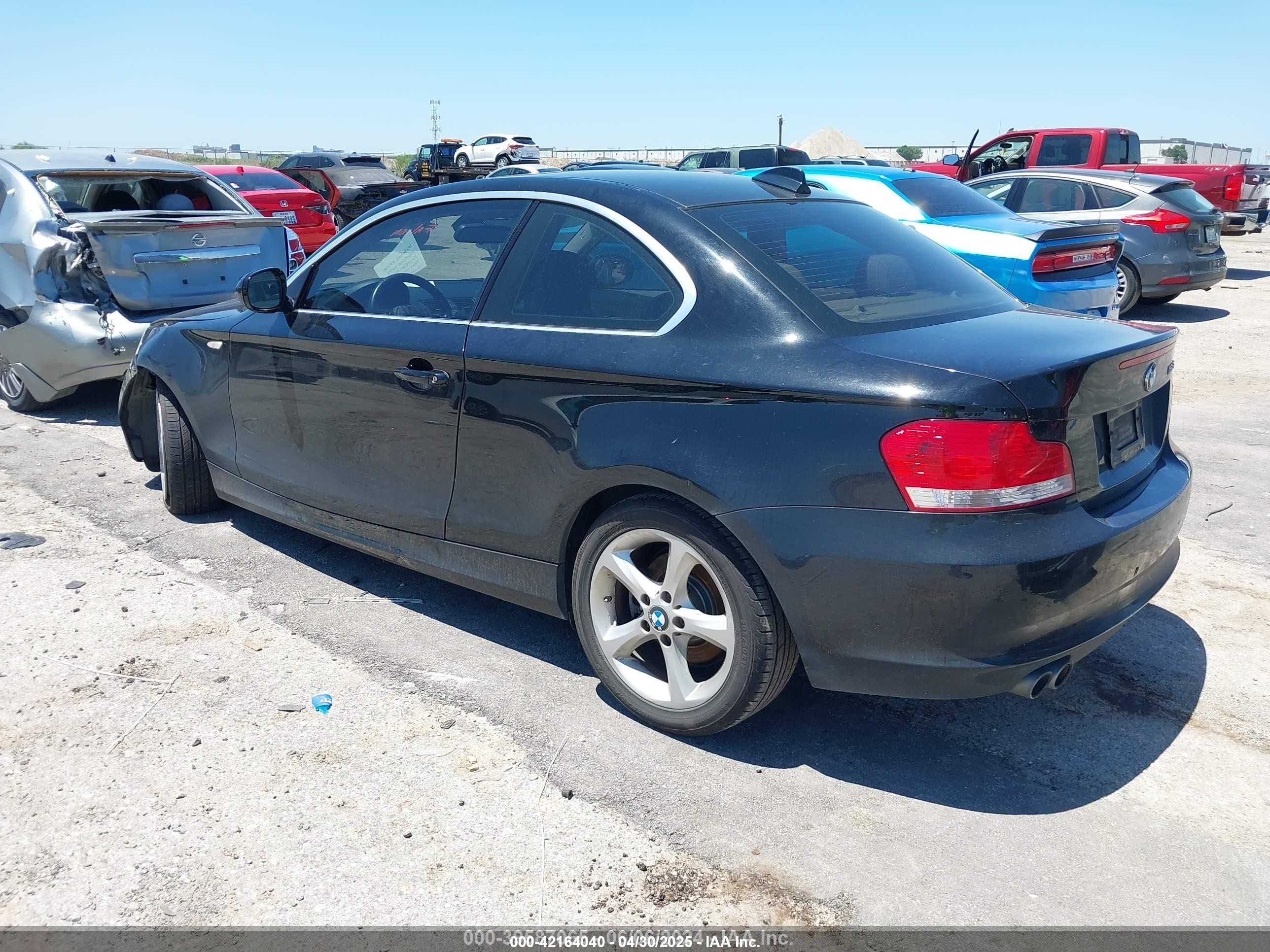 2010 Bmw 128i   Black vin: WBAUP7C58AVK77493