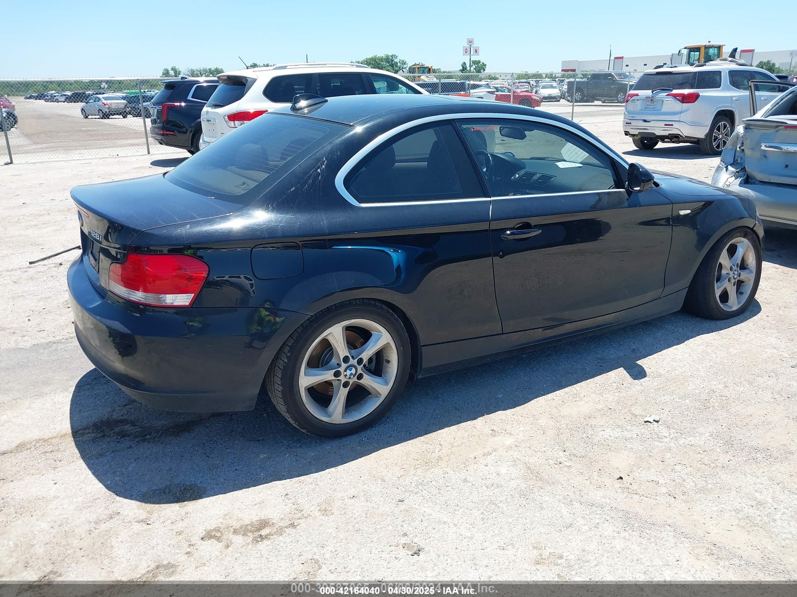 2010 Bmw 128i   Black vin: WBAUP7C58AVK77493