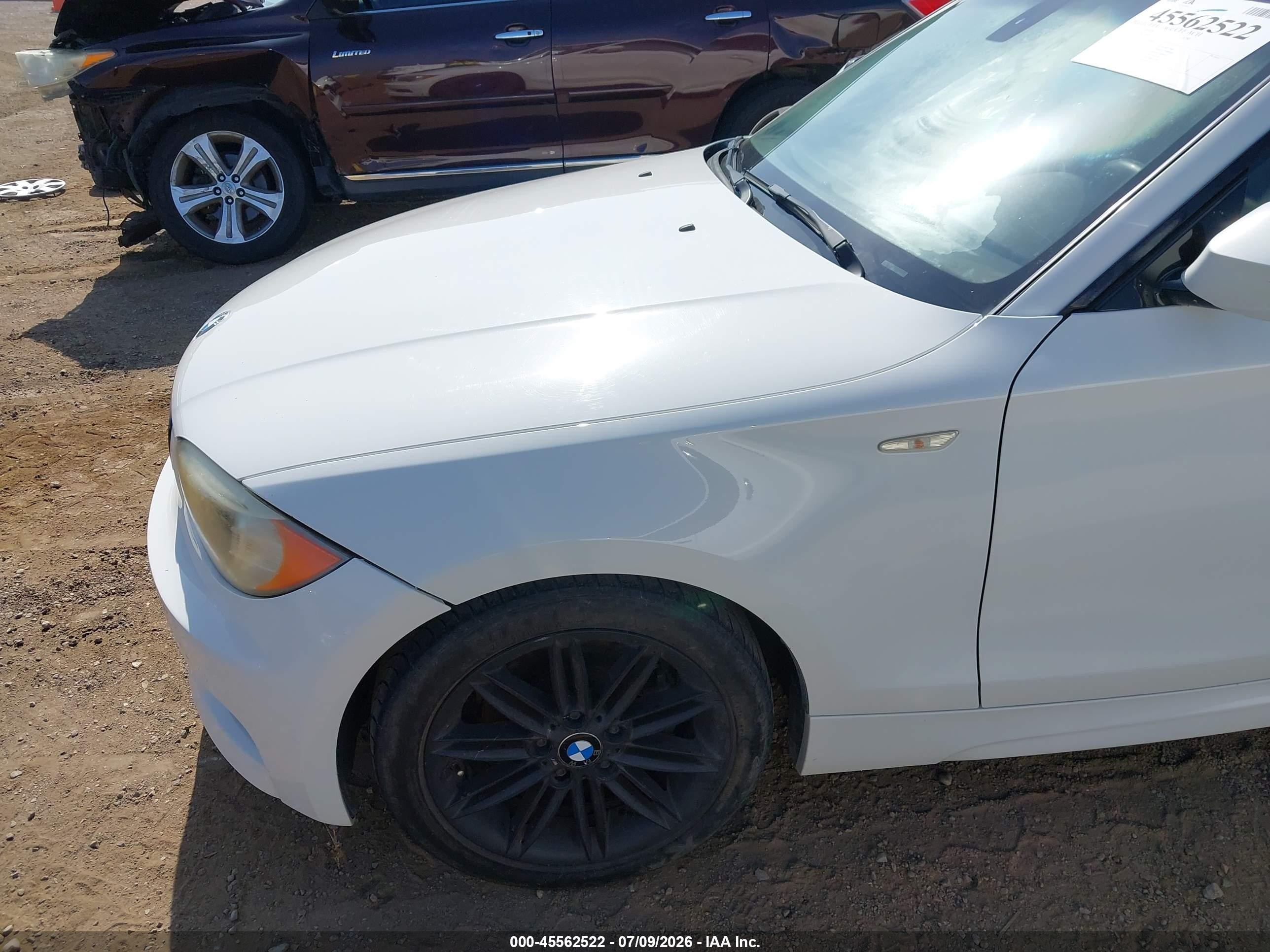 2012 Bmw 128i   White vin: WBAUP7C58CVM55213