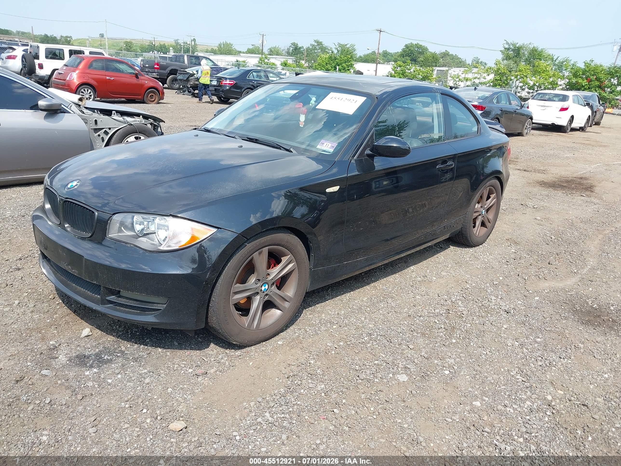 2009 Bmw 128i   Black vin: WBAUP93549VF48821