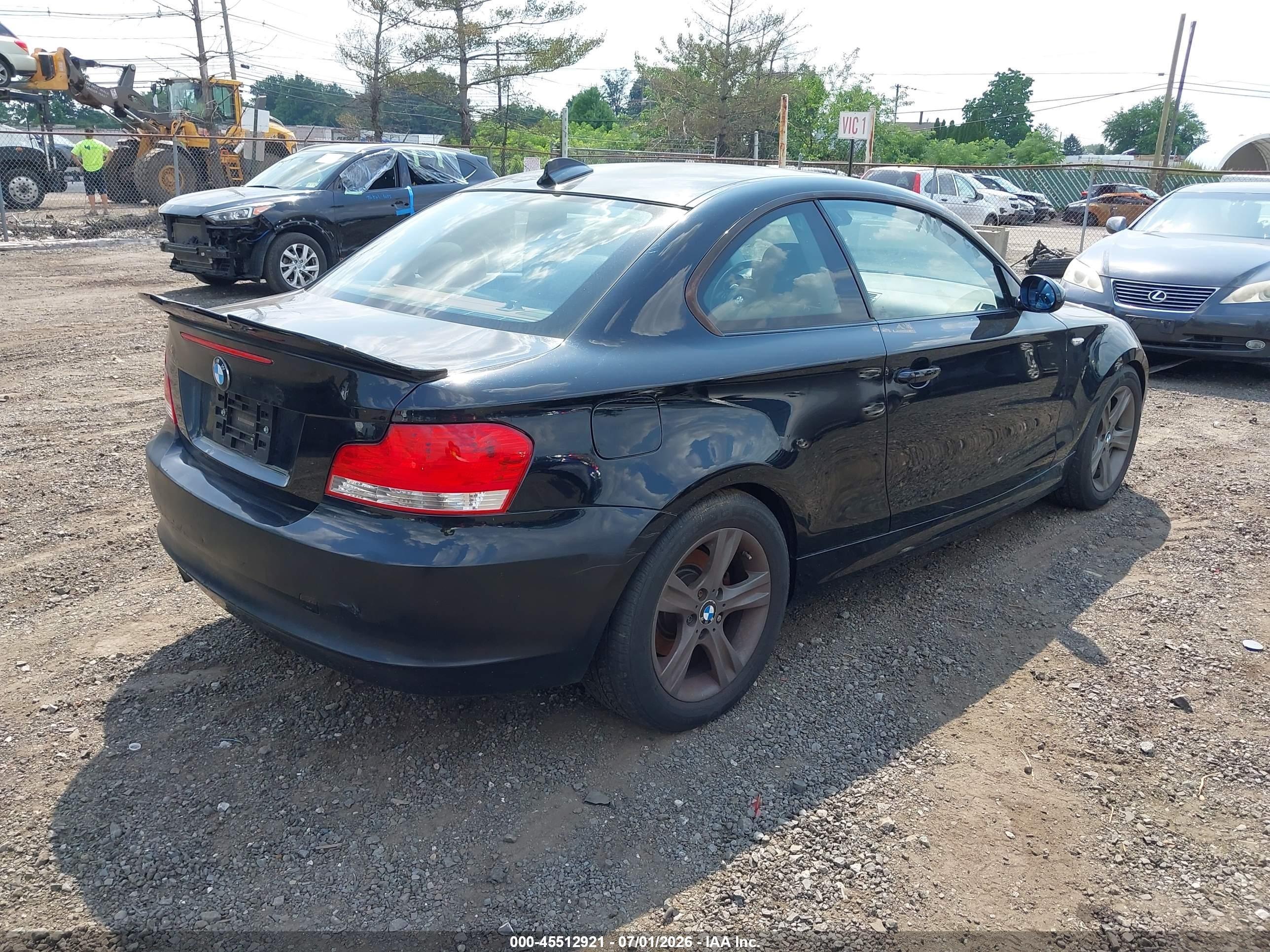 2009 Bmw 128i   Black vin: WBAUP93549VF48821