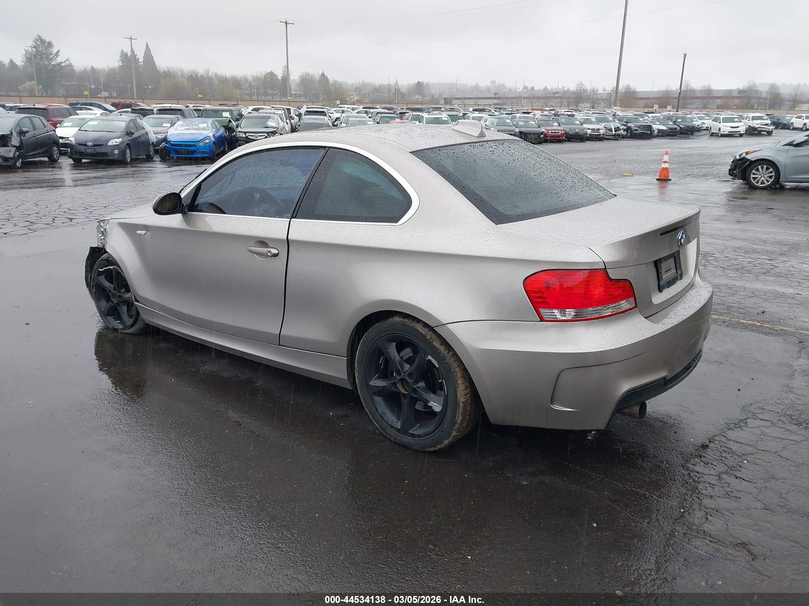 2009 Bmw 128i   Gold vin: WBAUP93599VF49303