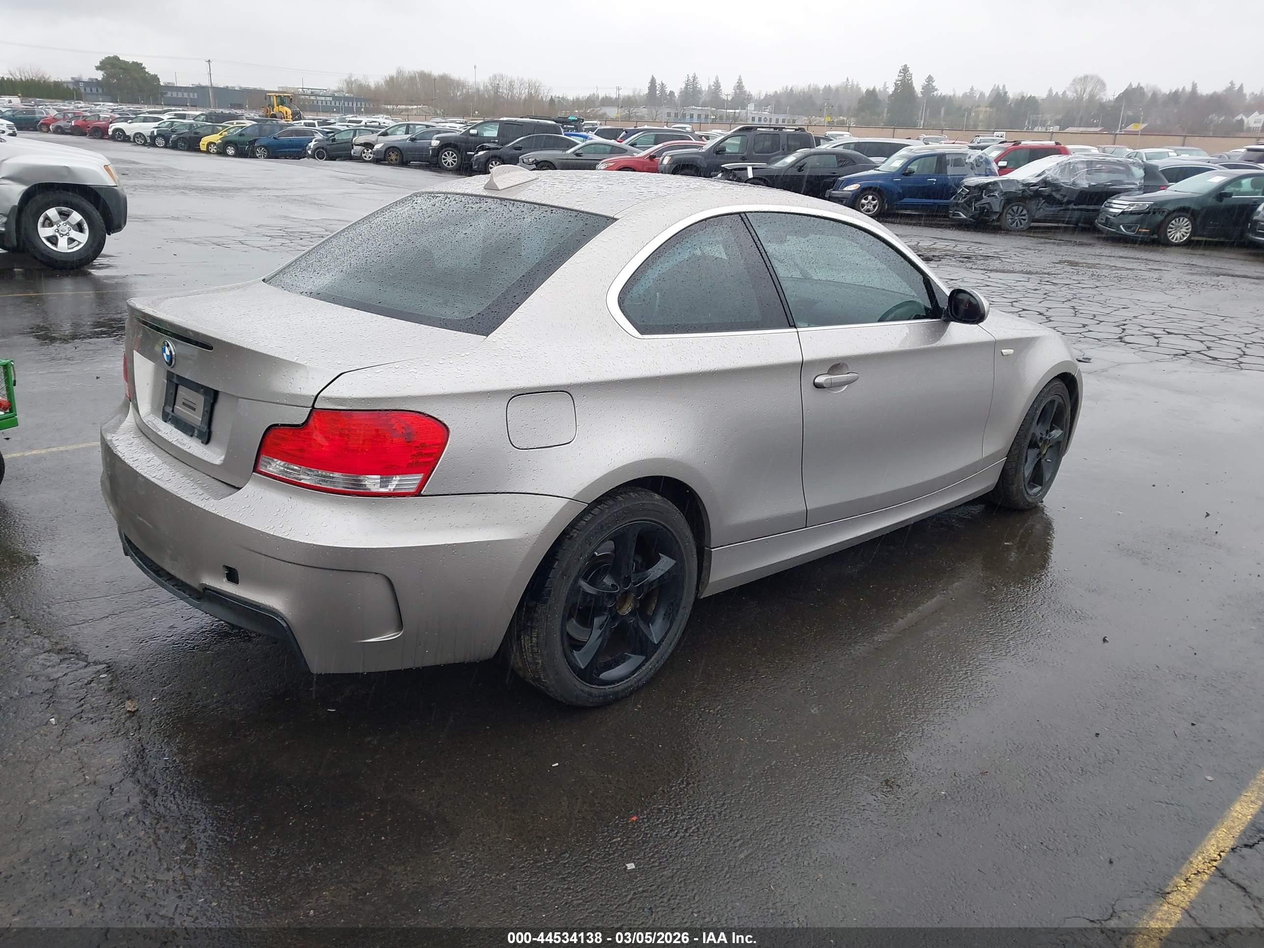 2009 Bmw 128i   Gold vin: WBAUP93599VF49303