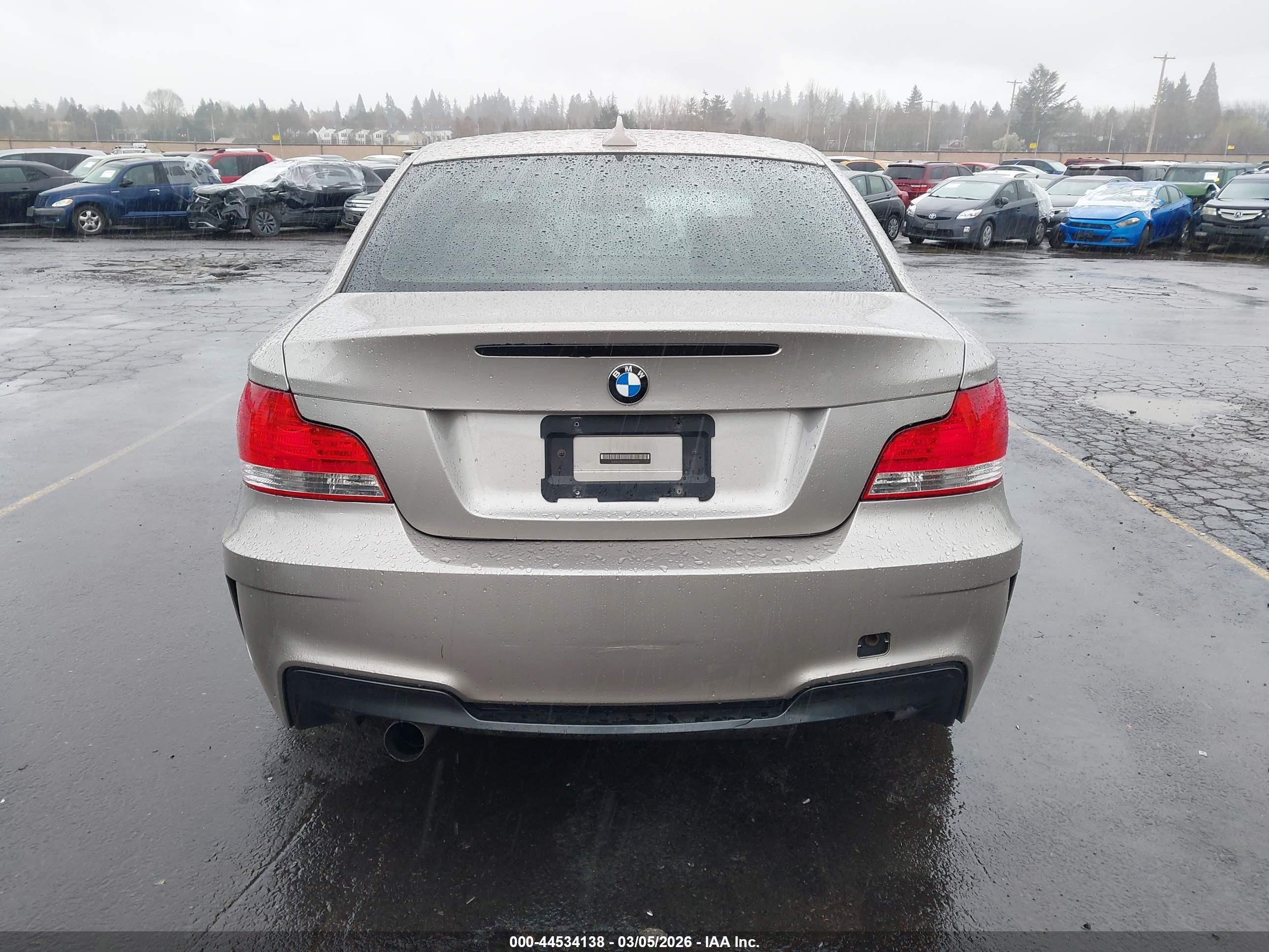 2009 Bmw 128i   Gold vin: WBAUP93599VF49303