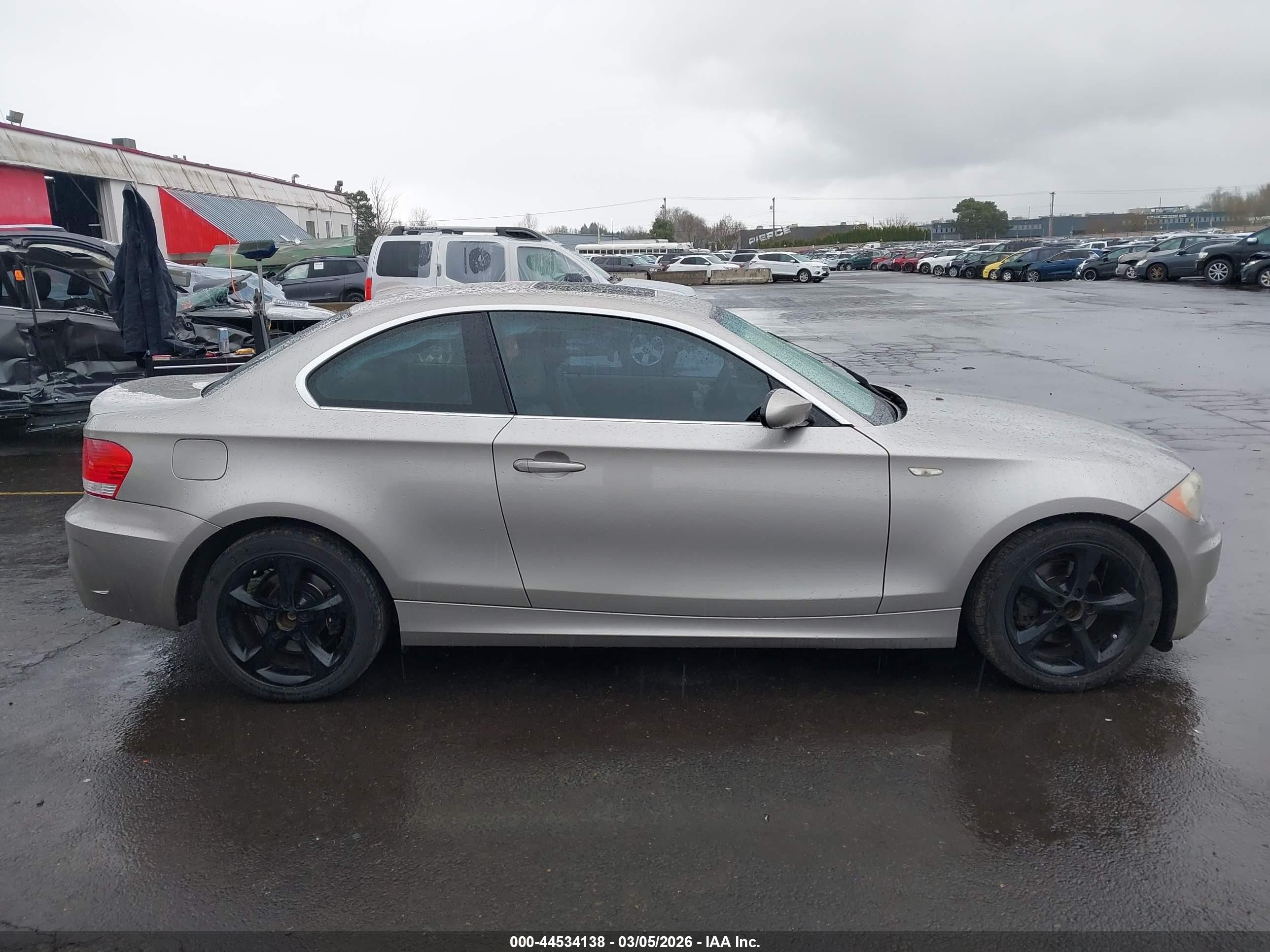 2009 Bmw 128i   Gold vin: WBAUP93599VF49303